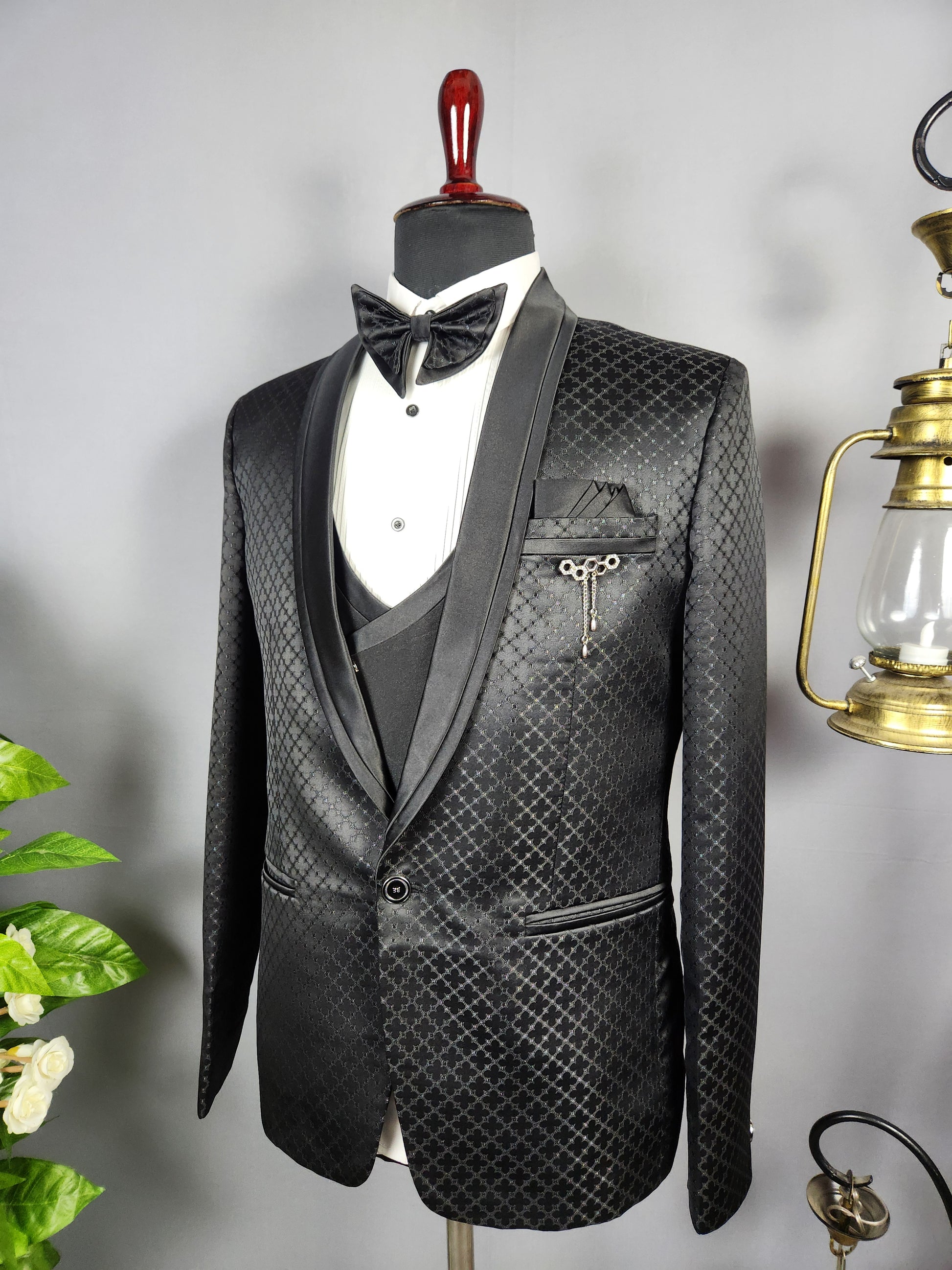 Men's black tuxedo suit for Indian groom, perfect for wedding and reception wear