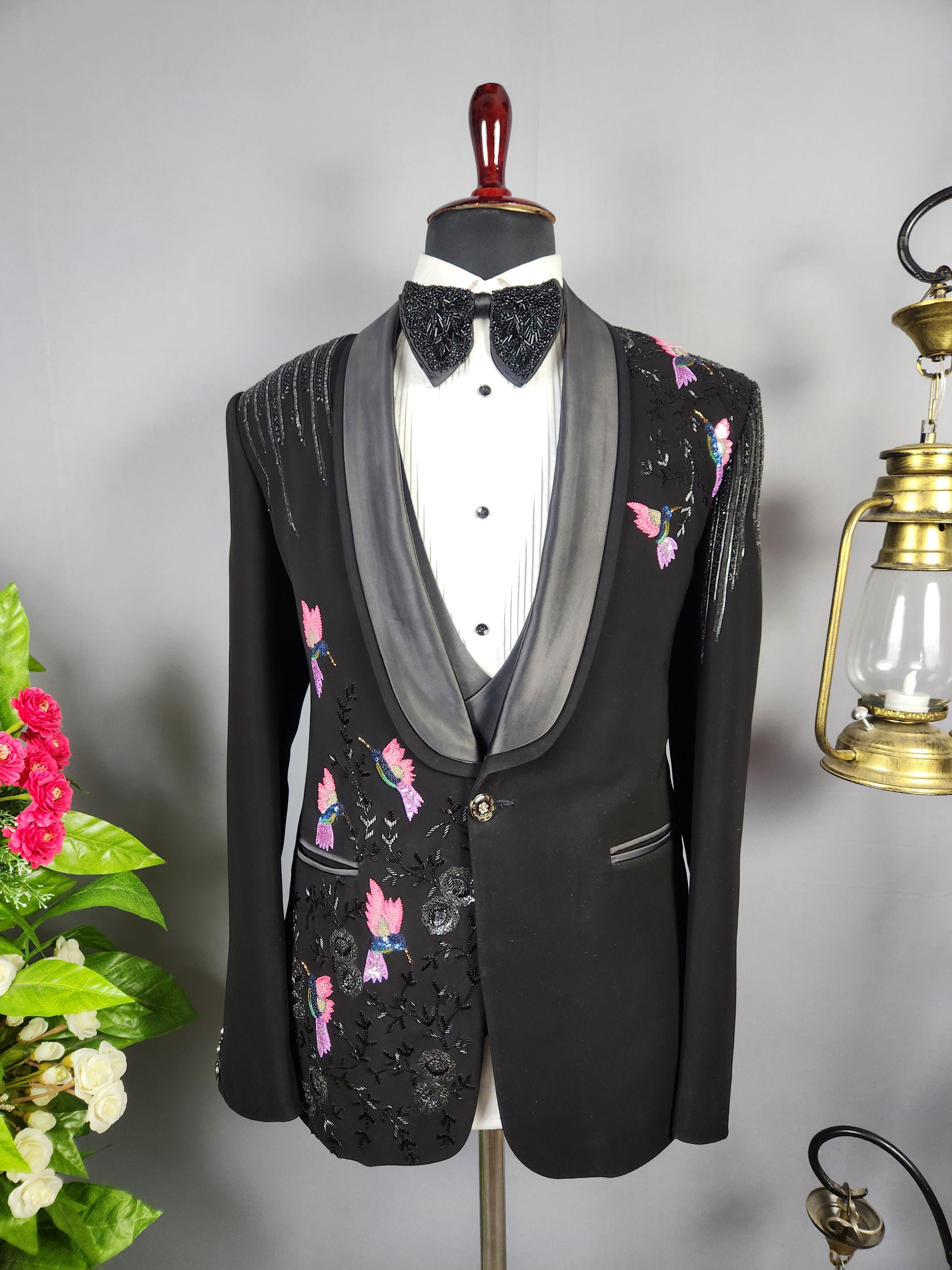 Men's black tuxedo suit for Indian groom, perfect for wedding and reception wear