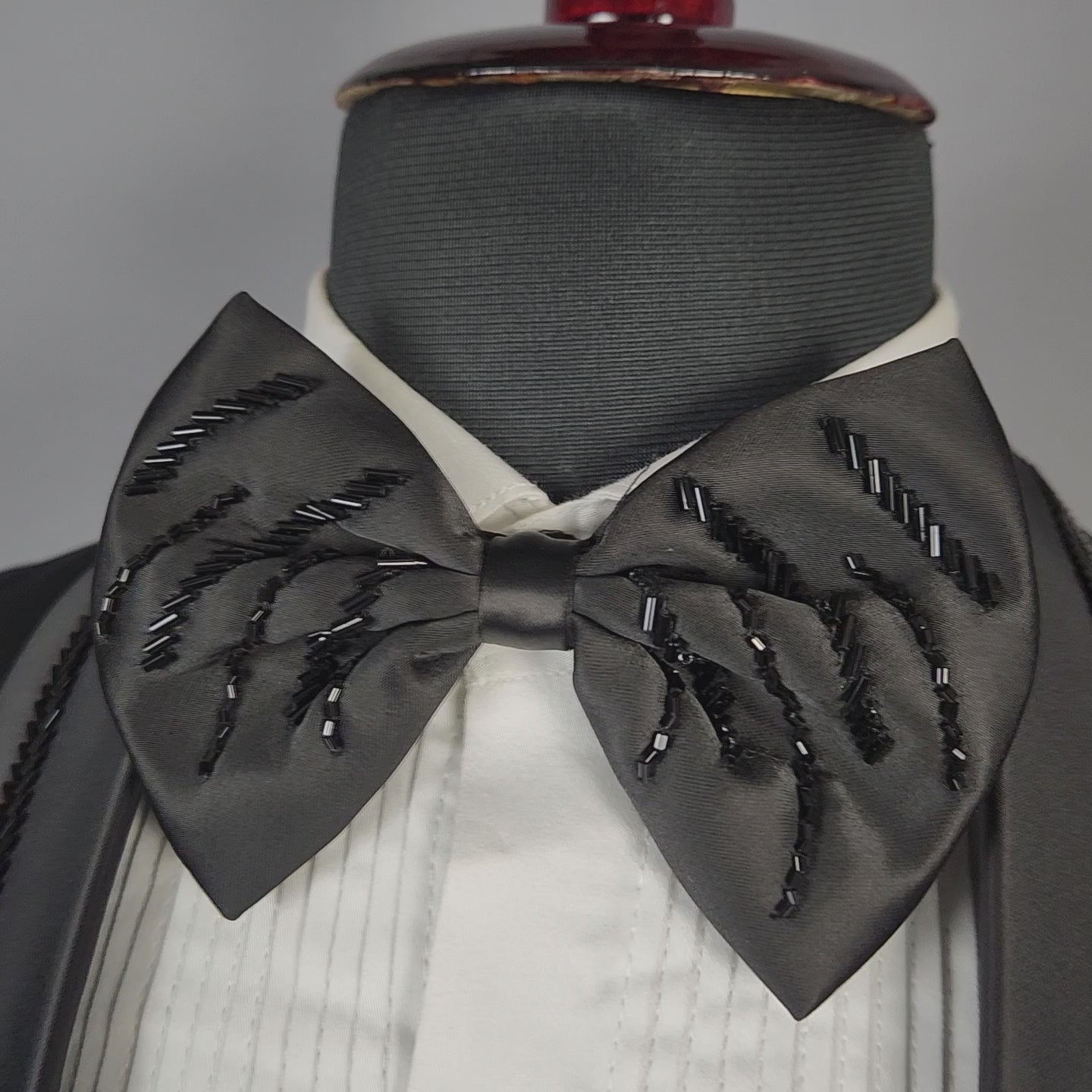 Men's black tuxedo suit for Indian groom, perfect for wedding and reception wear