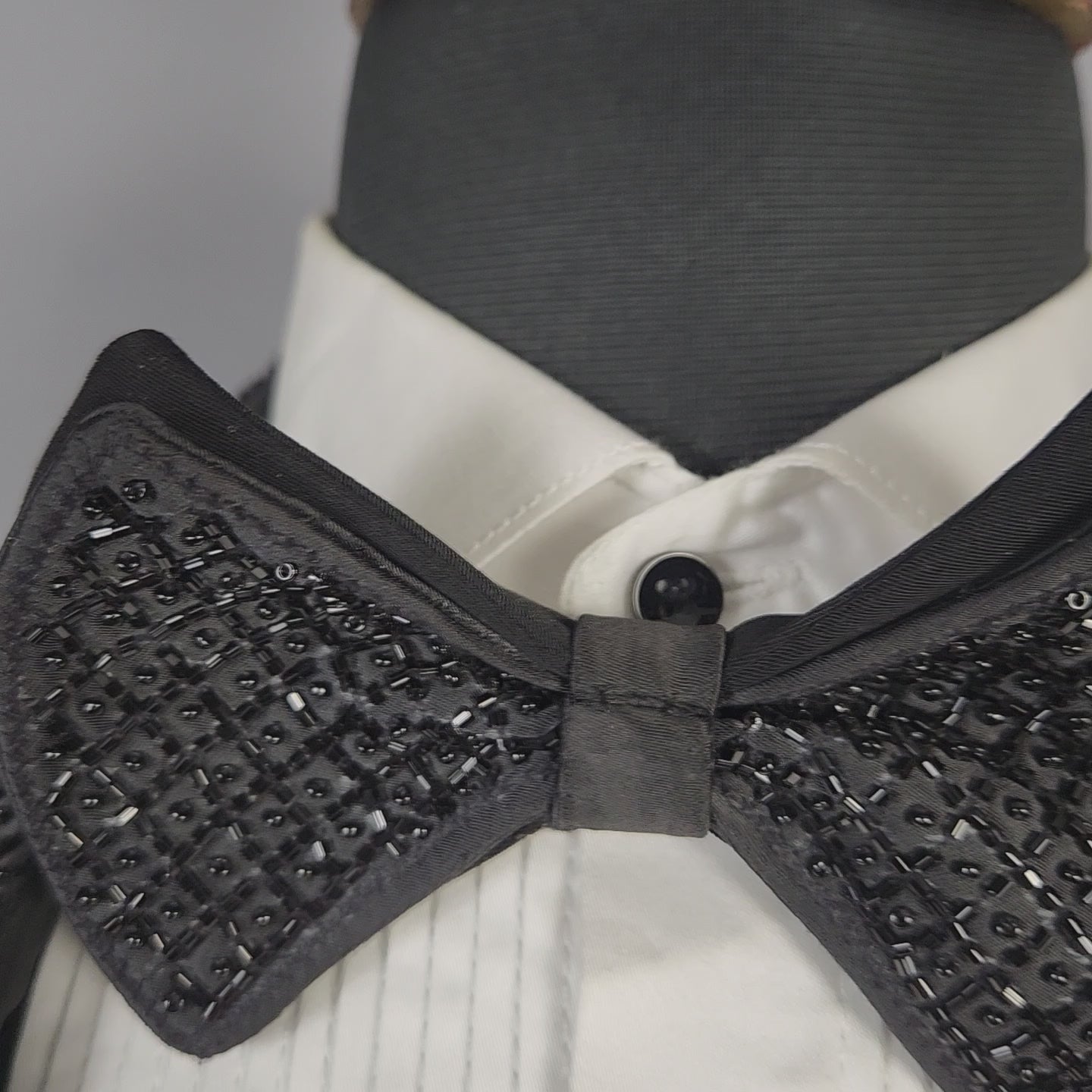 Men's black tuxedo suit for Indian groom, perfect for wedding and reception wear