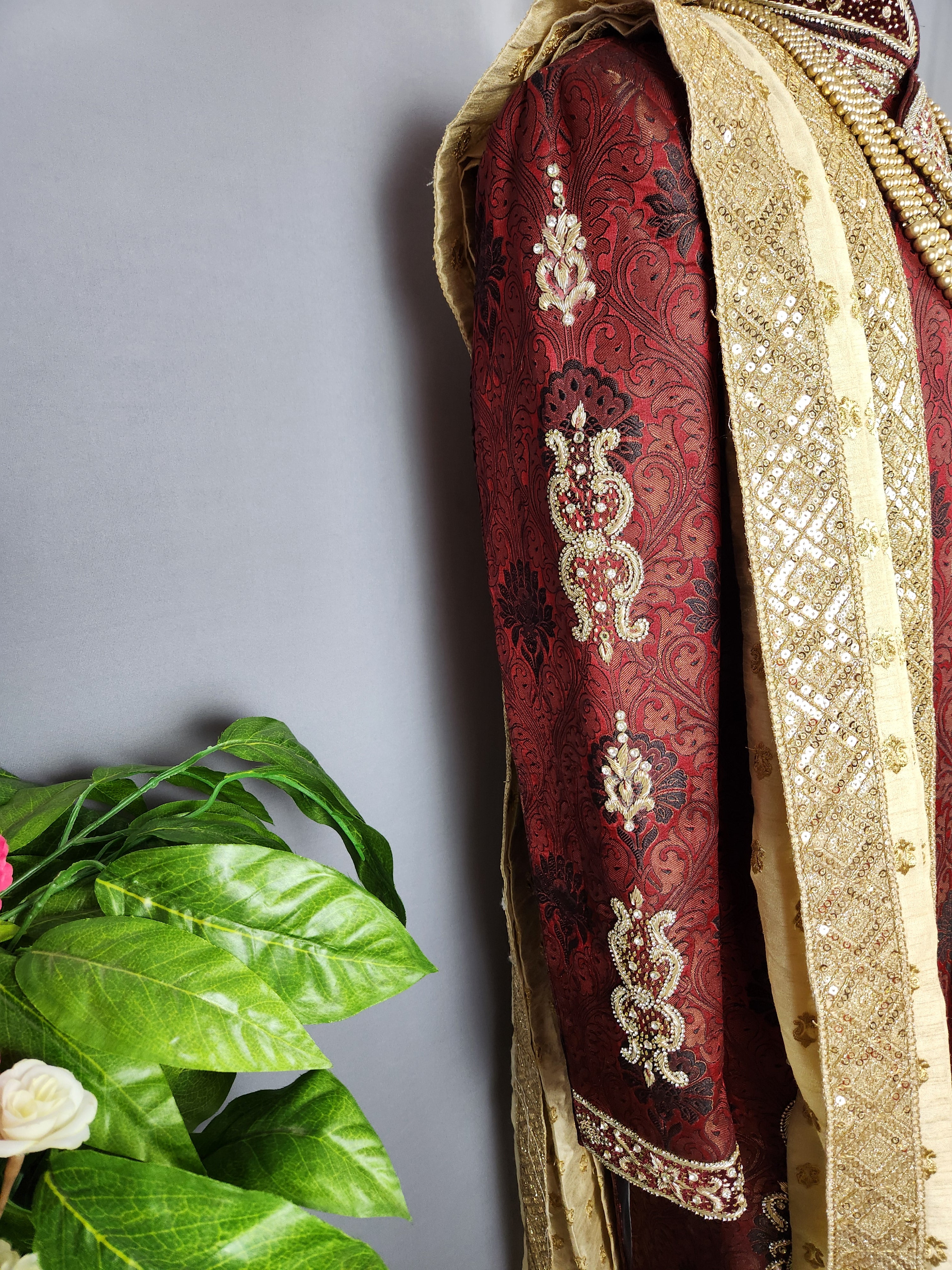 Red Sherwani Groom Wedding with zardozi work