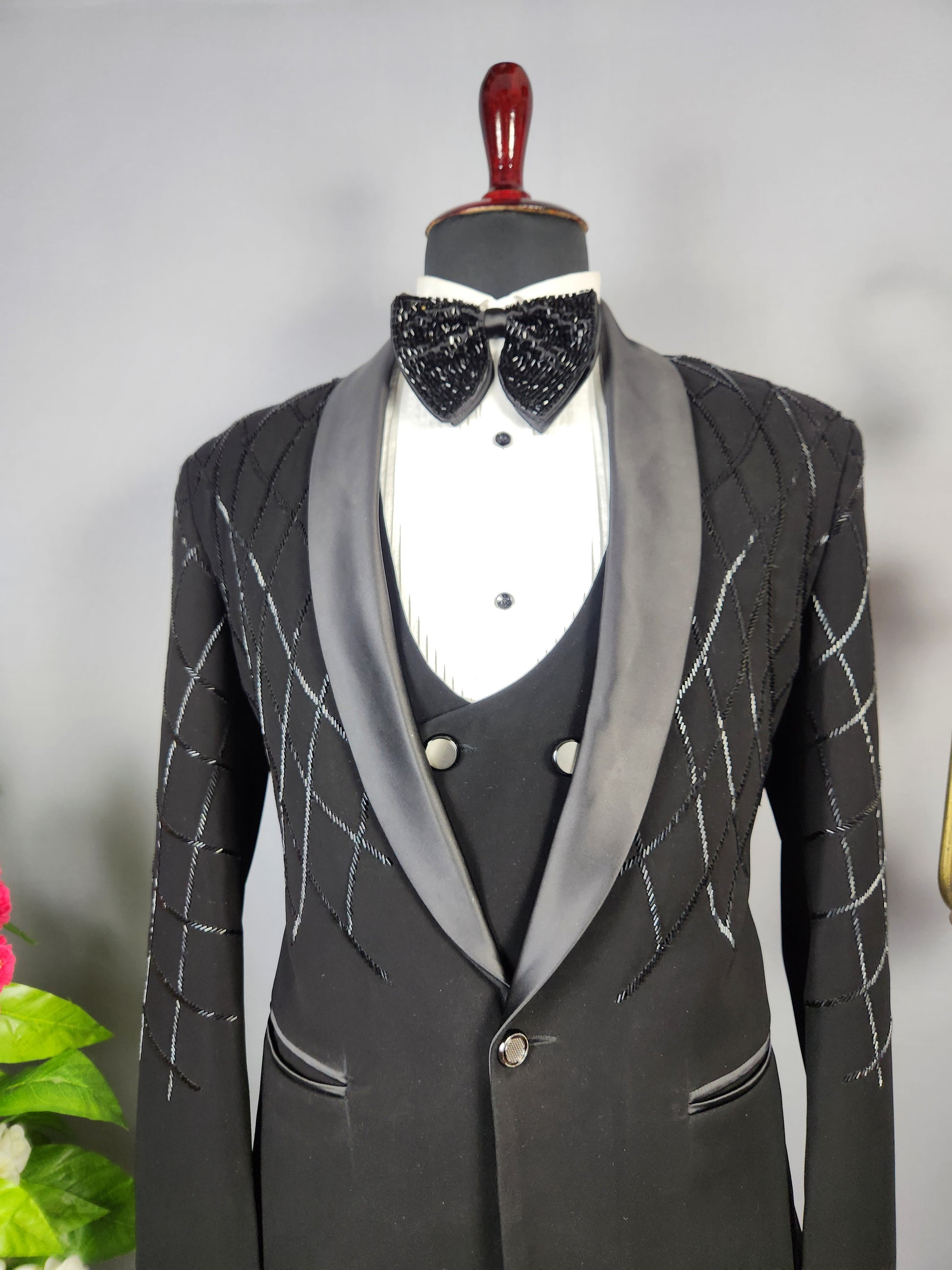 Men's black tuxedo suit for Indian groom, perfect for wedding and reception wear