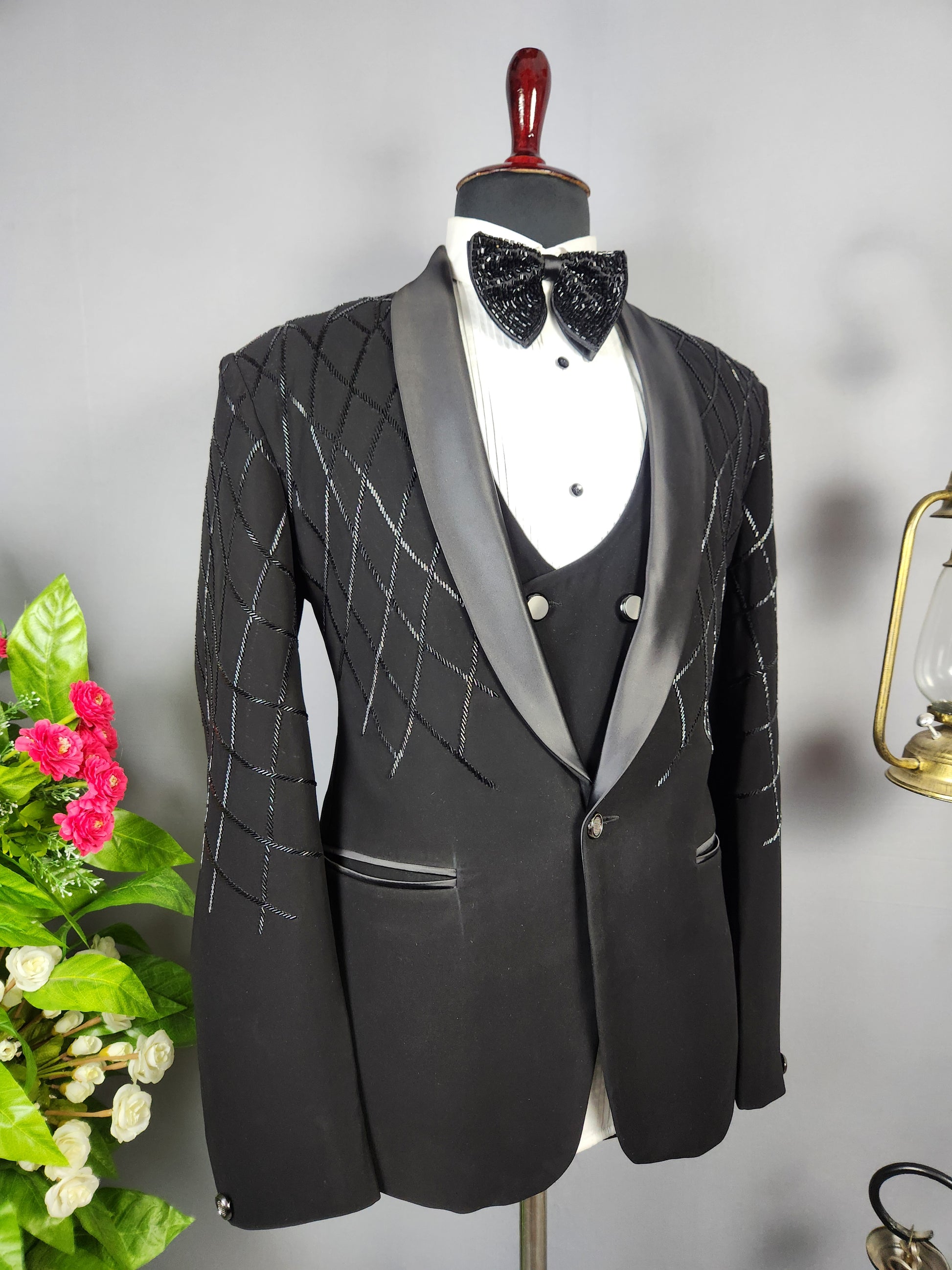 Men's black tuxedo suit for Indian groom, perfect for wedding and reception wear