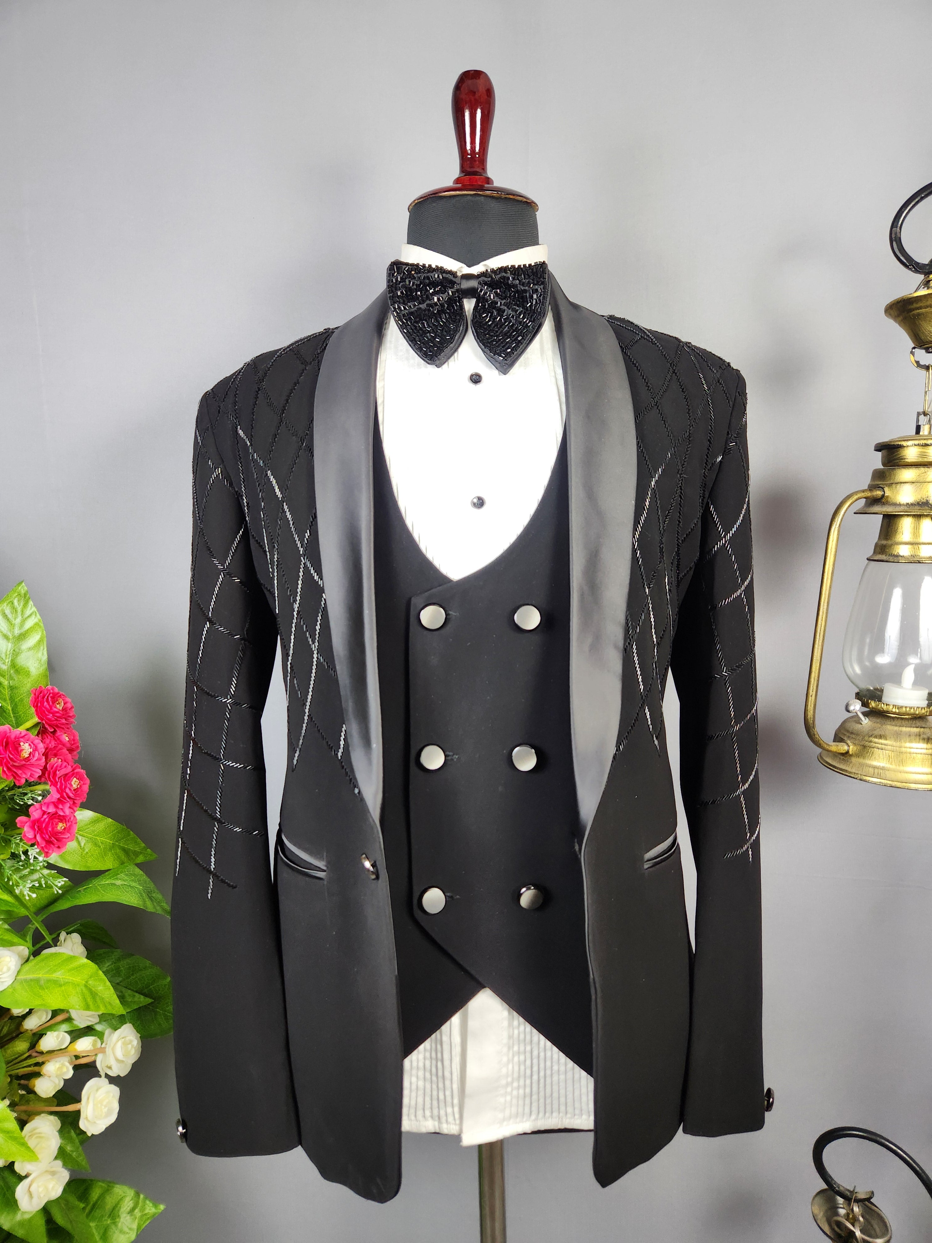 Men's black tuxedo suit for Indian groom, perfect for wedding and reception wear