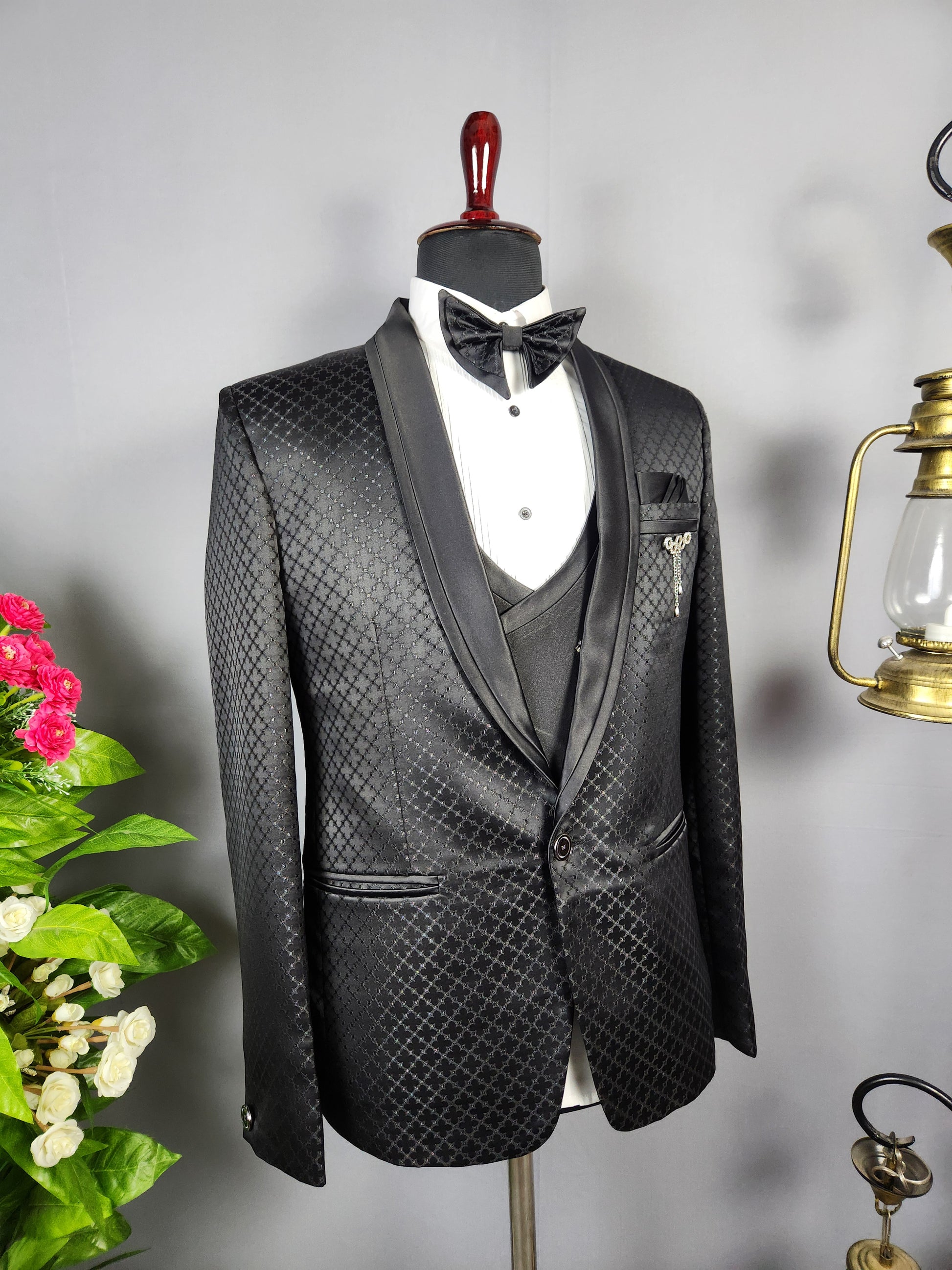 Men's black tuxedo suit for Indian groom, perfect for wedding and reception wear
