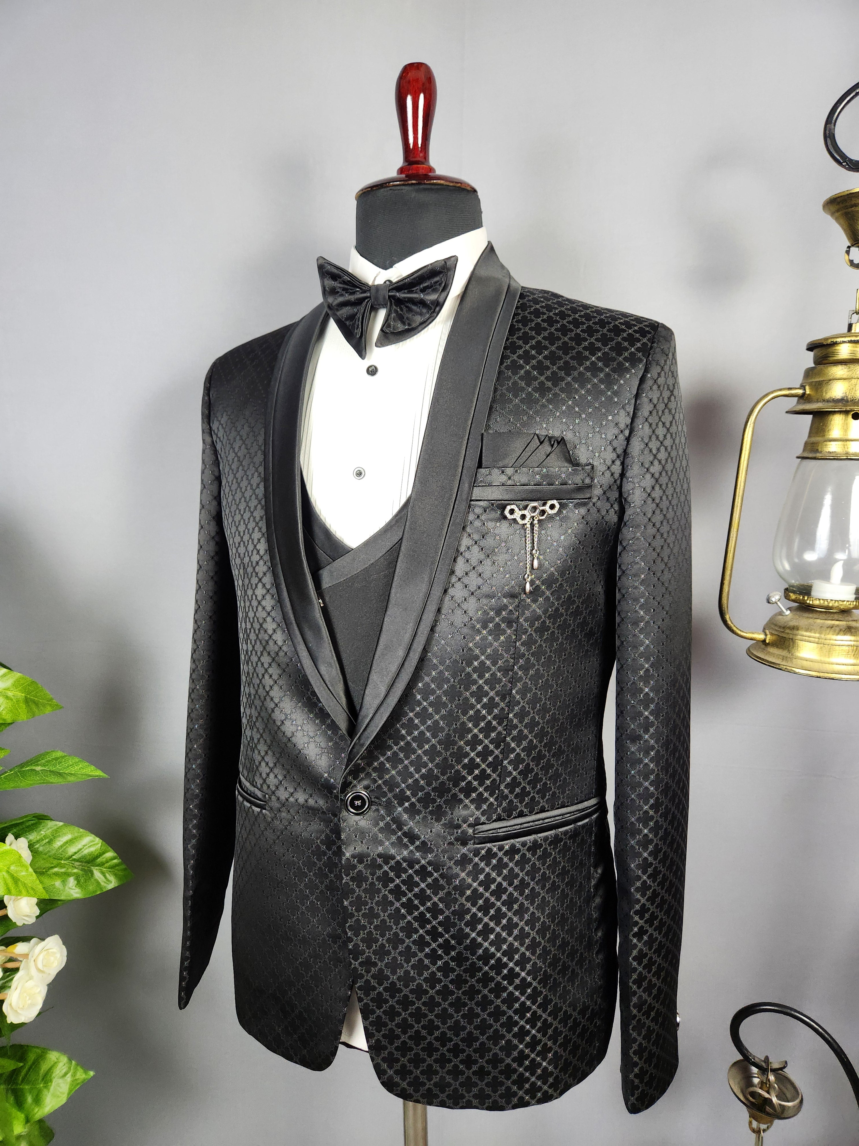 Men's black tuxedo suit for Indian groom, perfect for wedding and reception wear
