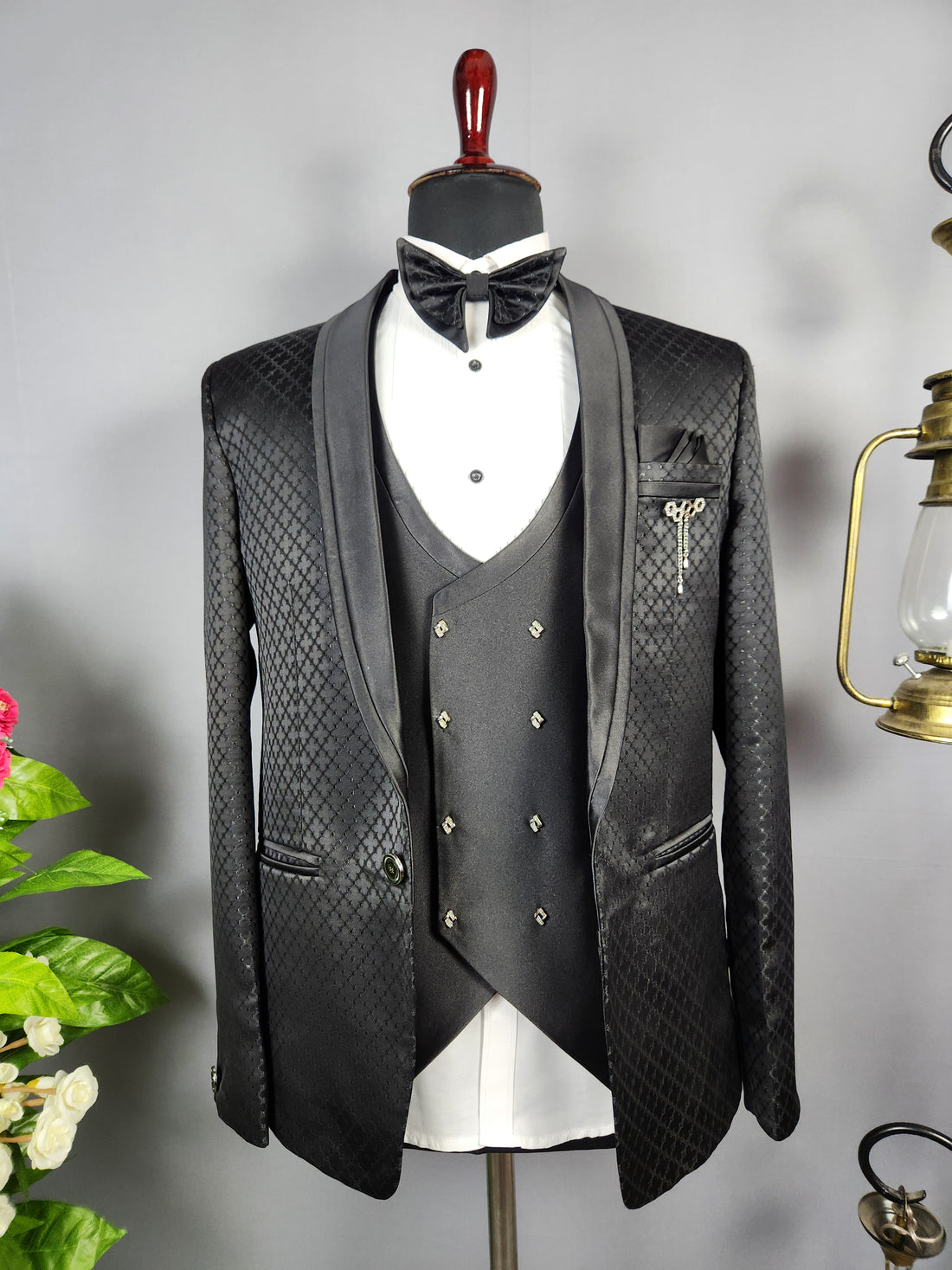 Men's black tuxedo suit for Indian groom, perfect for wedding and reception wear
