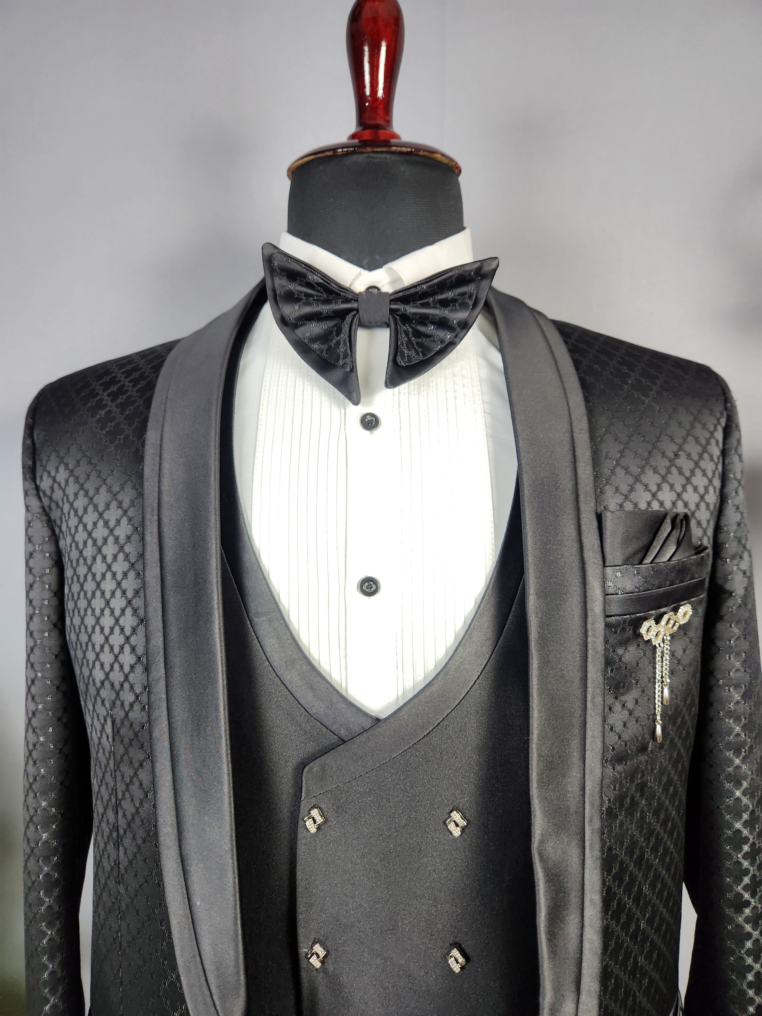 Men's black tuxedo suit for Indian groom, perfect for wedding and reception wear
