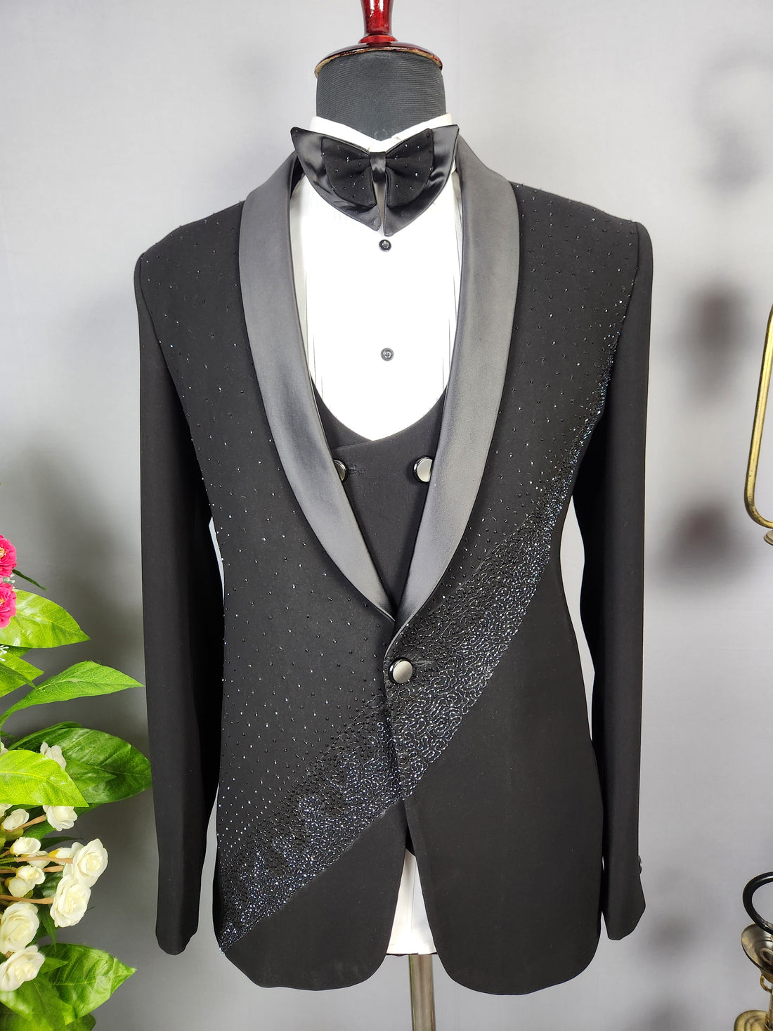 Men's black tuxedo suit for Indian groom, perfect for wedding and reception wear
