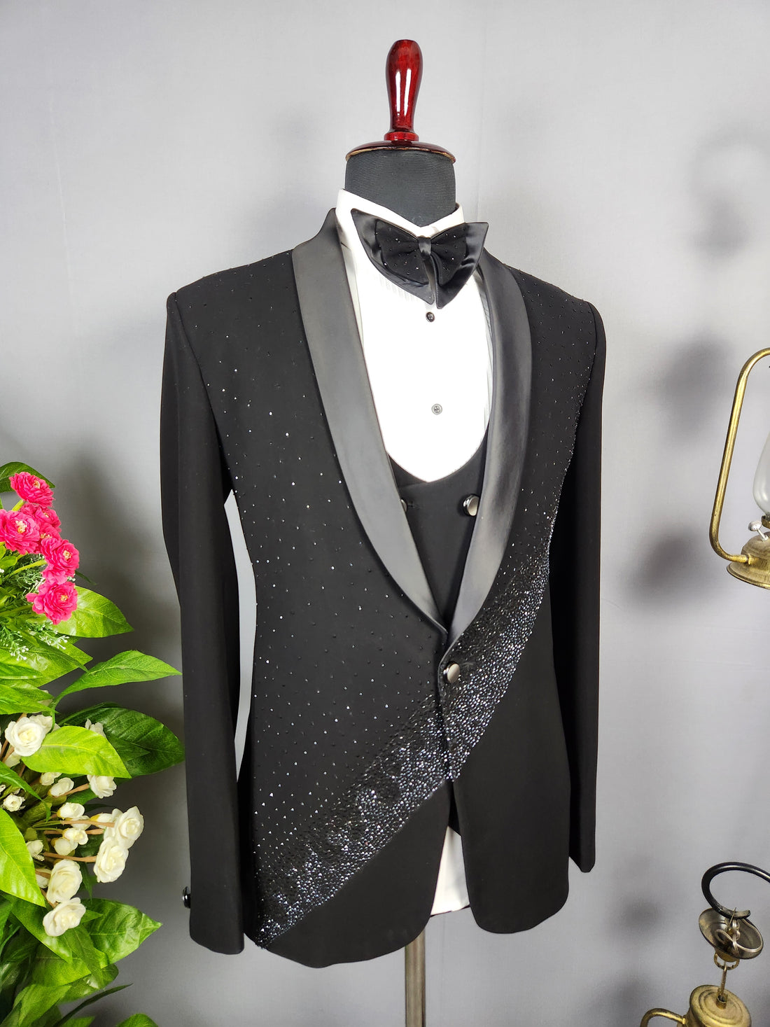 Men's black tuxedo suit for Indian groom, perfect for wedding and reception wear
