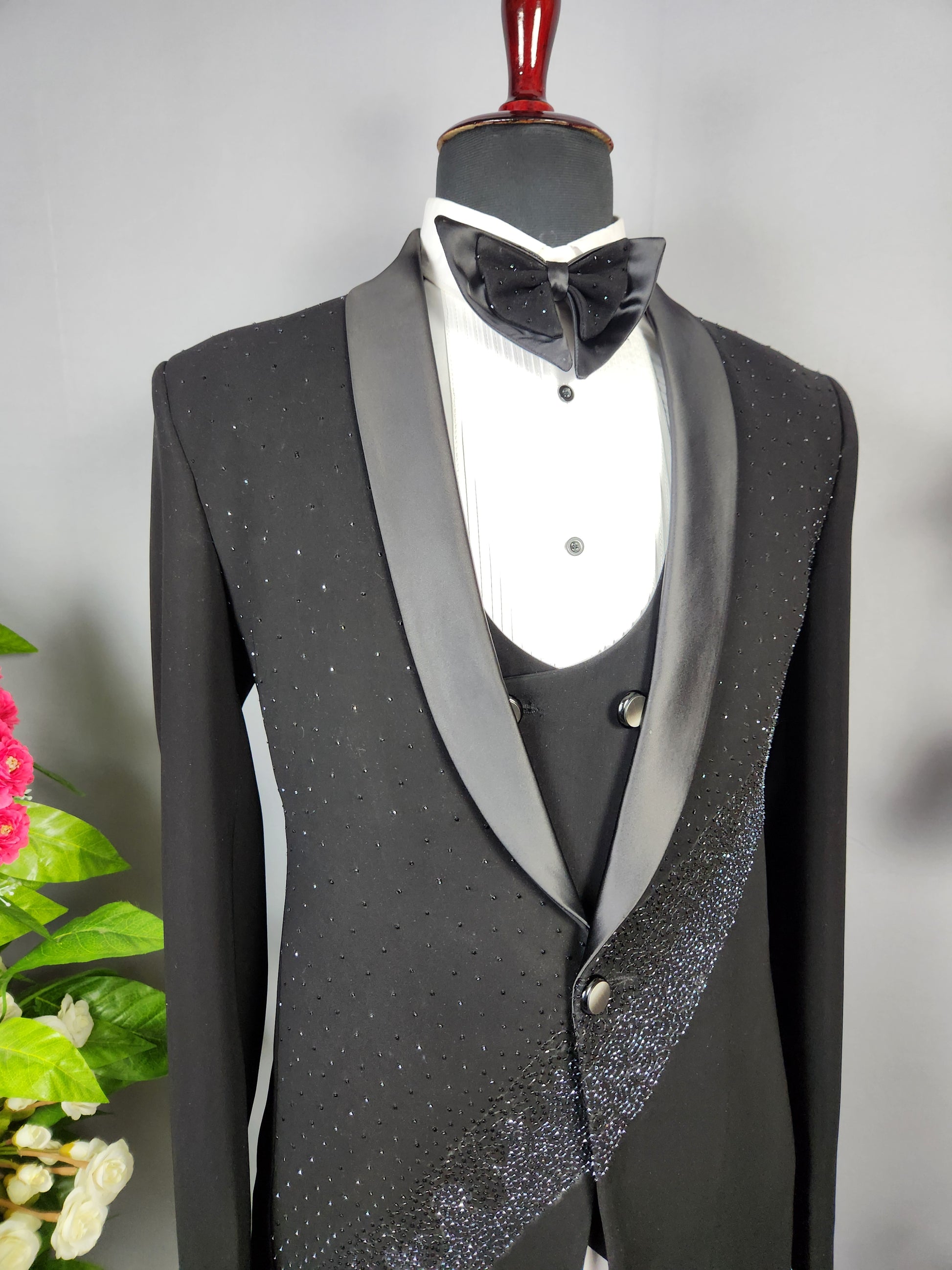 Men's black tuxedo suit for Indian groom, perfect for wedding and reception wear
