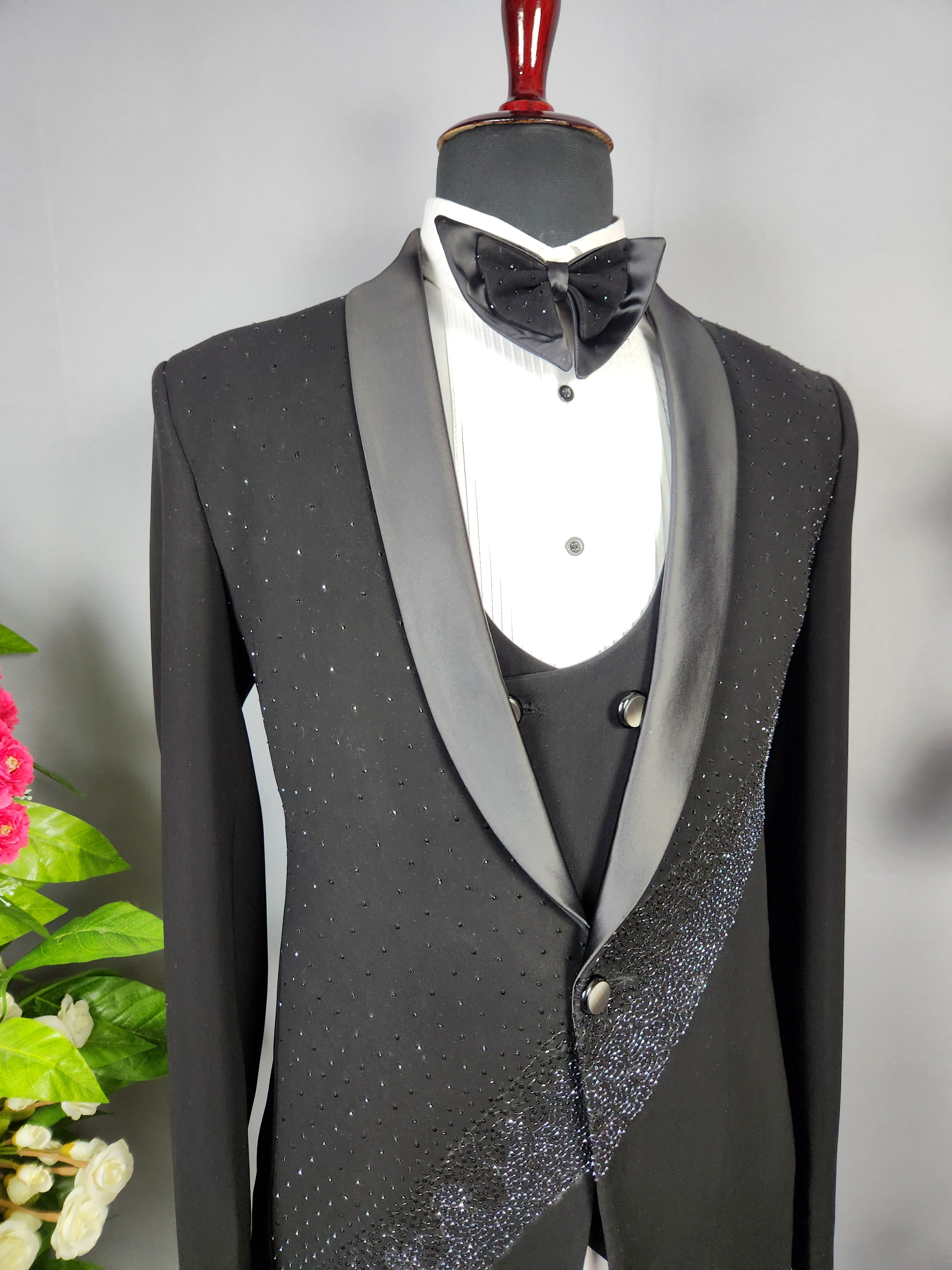 Men's black tuxedo suit for Indian groom, perfect for wedding and reception wear
