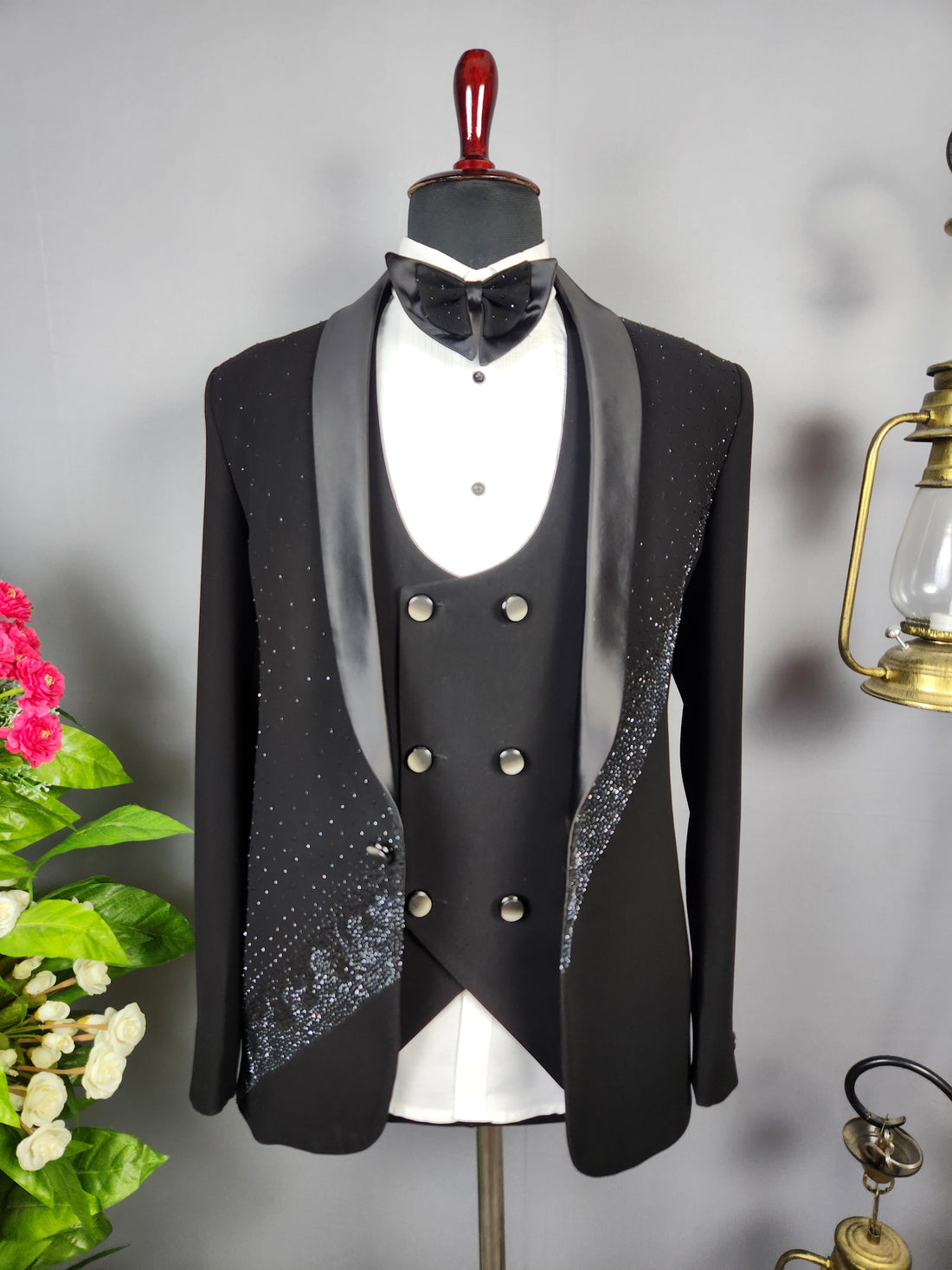 Men's black tuxedo suit for Indian groom, perfect for wedding and reception wear
