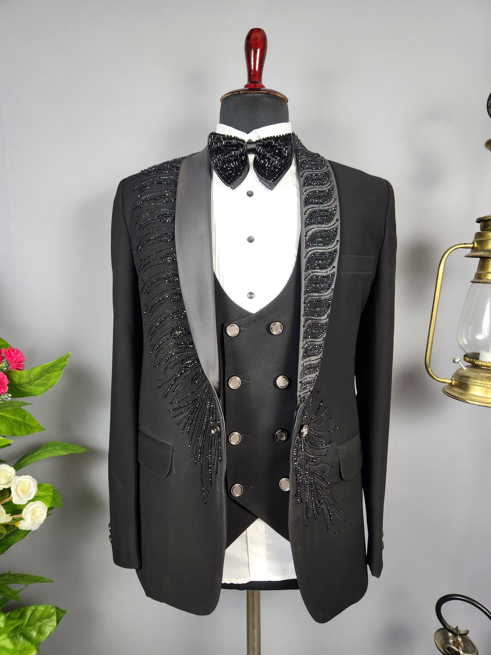 Men's black tuxedo suit for Indian groom, perfect for wedding and reception wear
