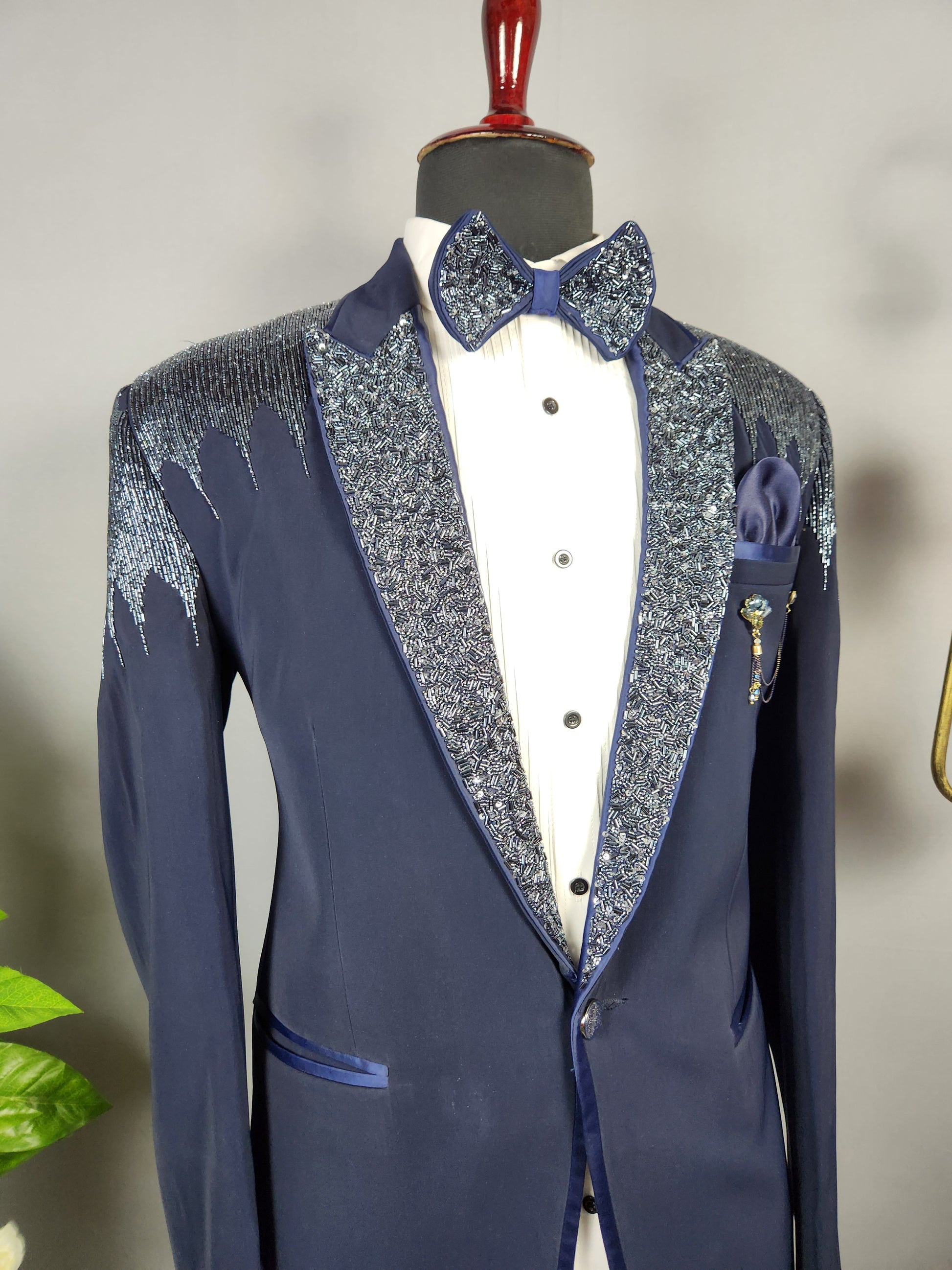 Men's blue tuxedo suit for Indian groom, perfect for wedding and reception wear
