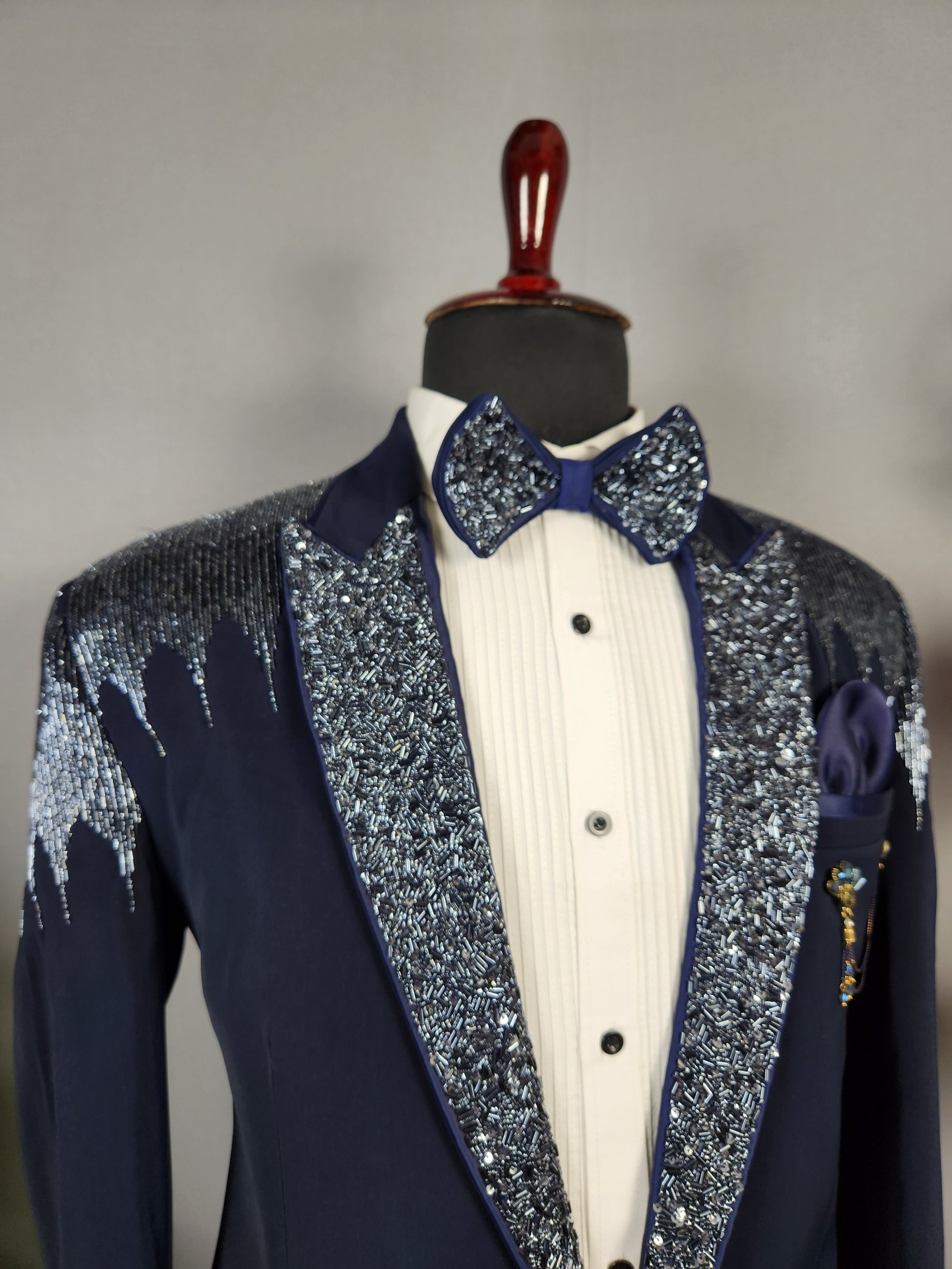Men's blue tuxedo suit for Indian groom, perfect for wedding and reception wear

