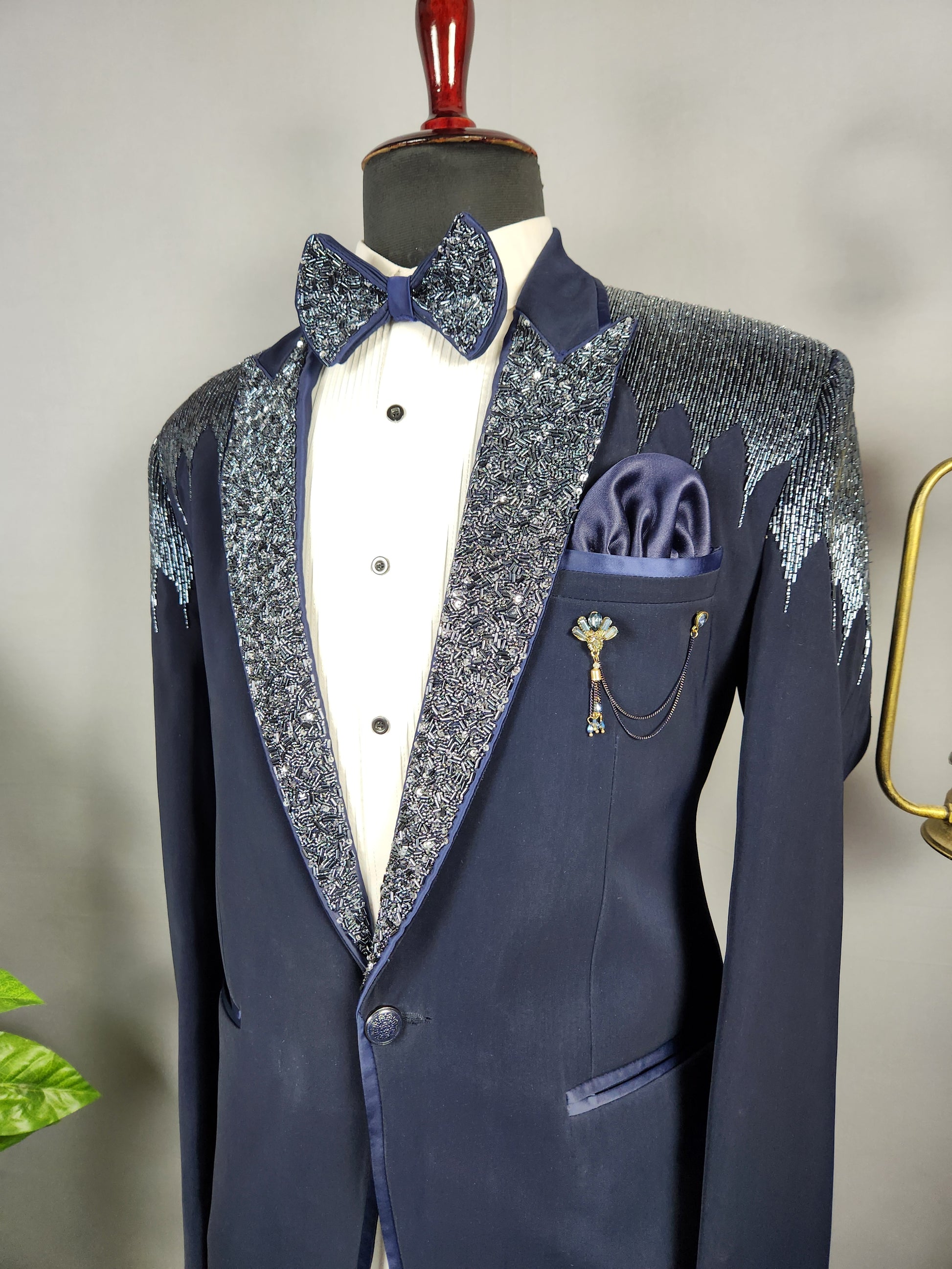 Men's blue tuxedo suit for Indian groom, perfect for wedding and reception wear
