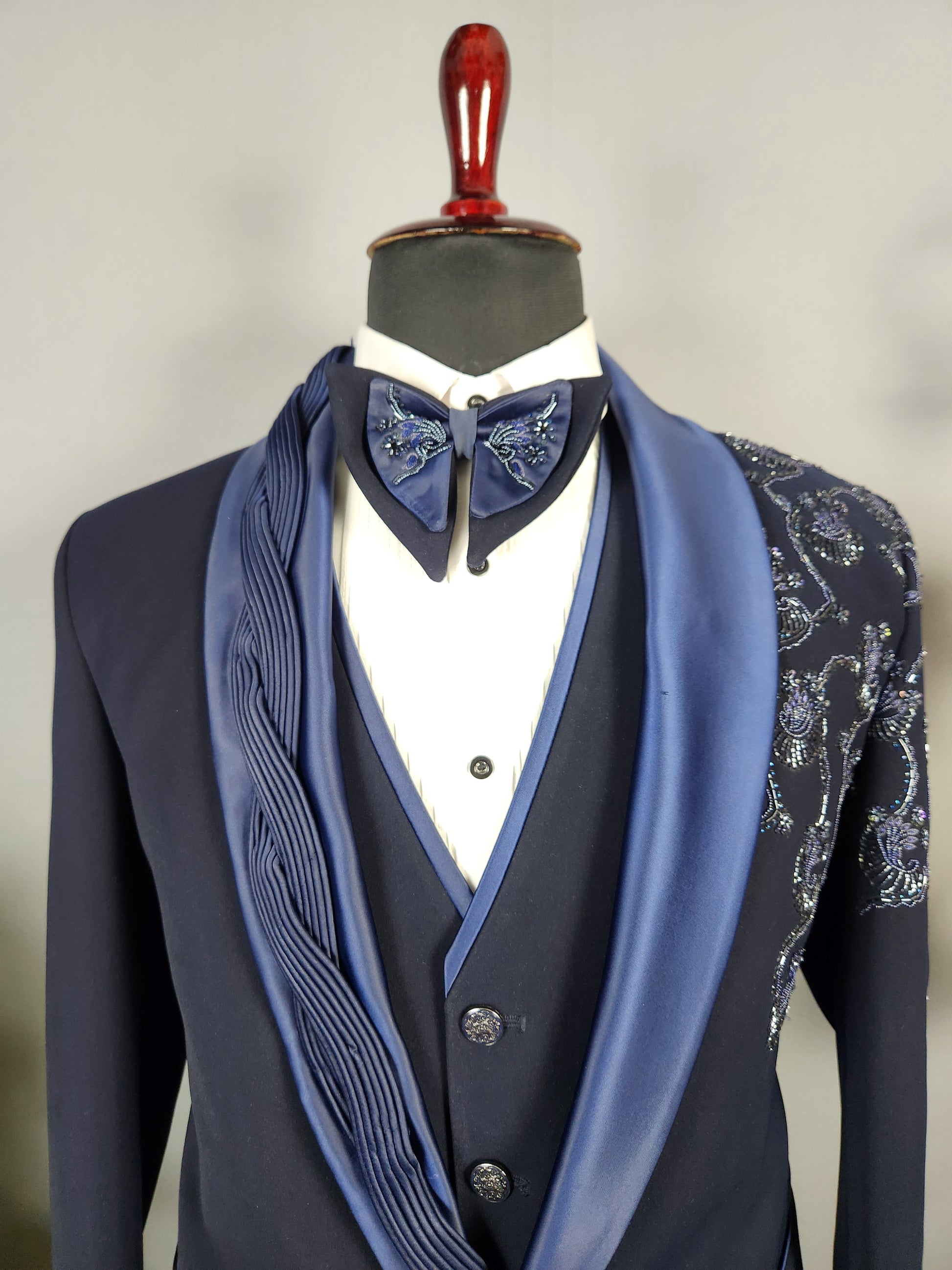 Men's blue tuxedo suit for Indian groom, perfect for wedding and reception wear
