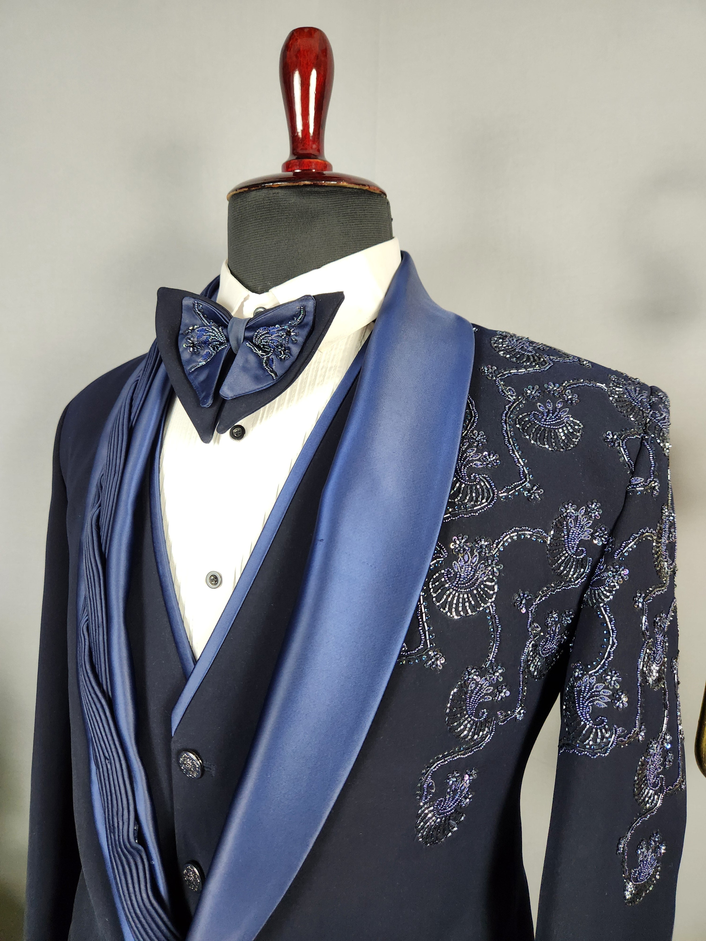Men's blue tuxedo suit for Indian groom, perfect for wedding and reception wear
