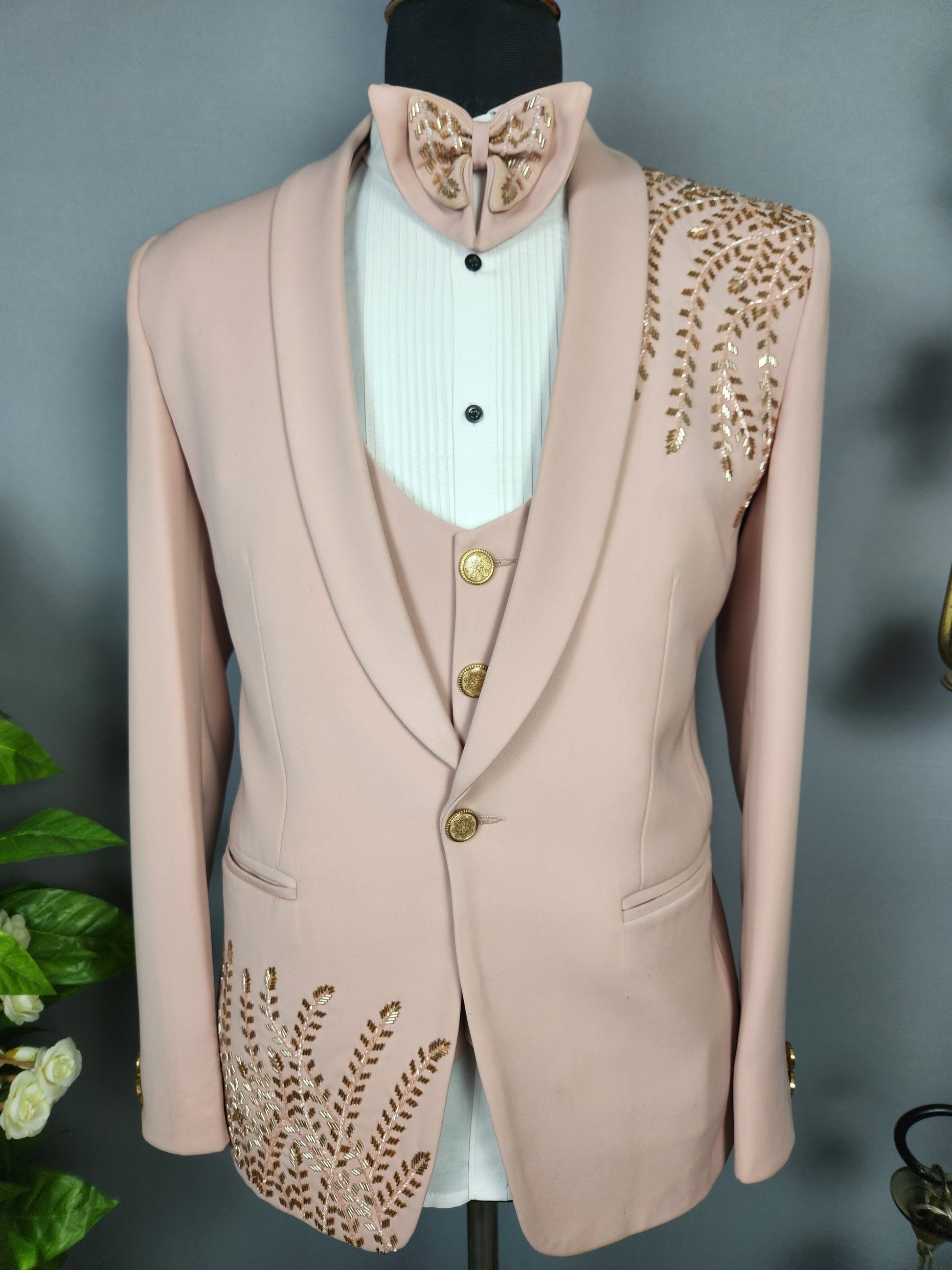 Men's dusty pink tuxedo suit for Indian groom, perfect for wedding and reception wear
