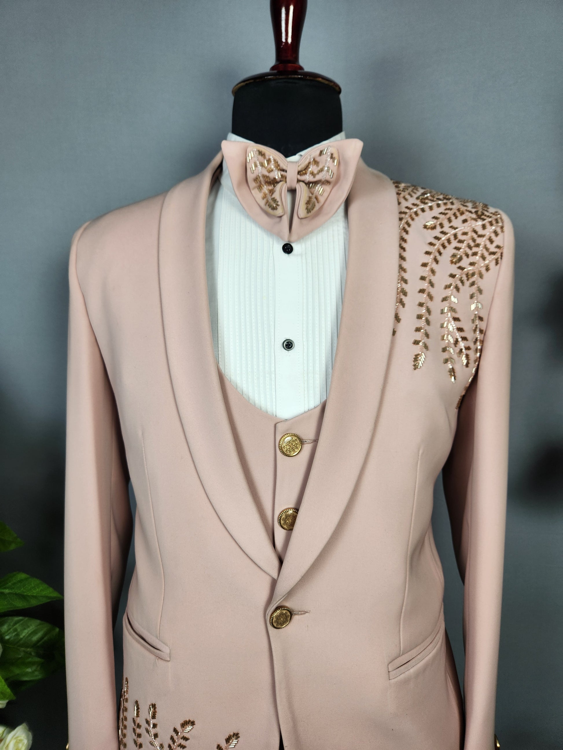 Men's dusty pink tuxedo suit for Indian groom, perfect for wedding and reception wear
