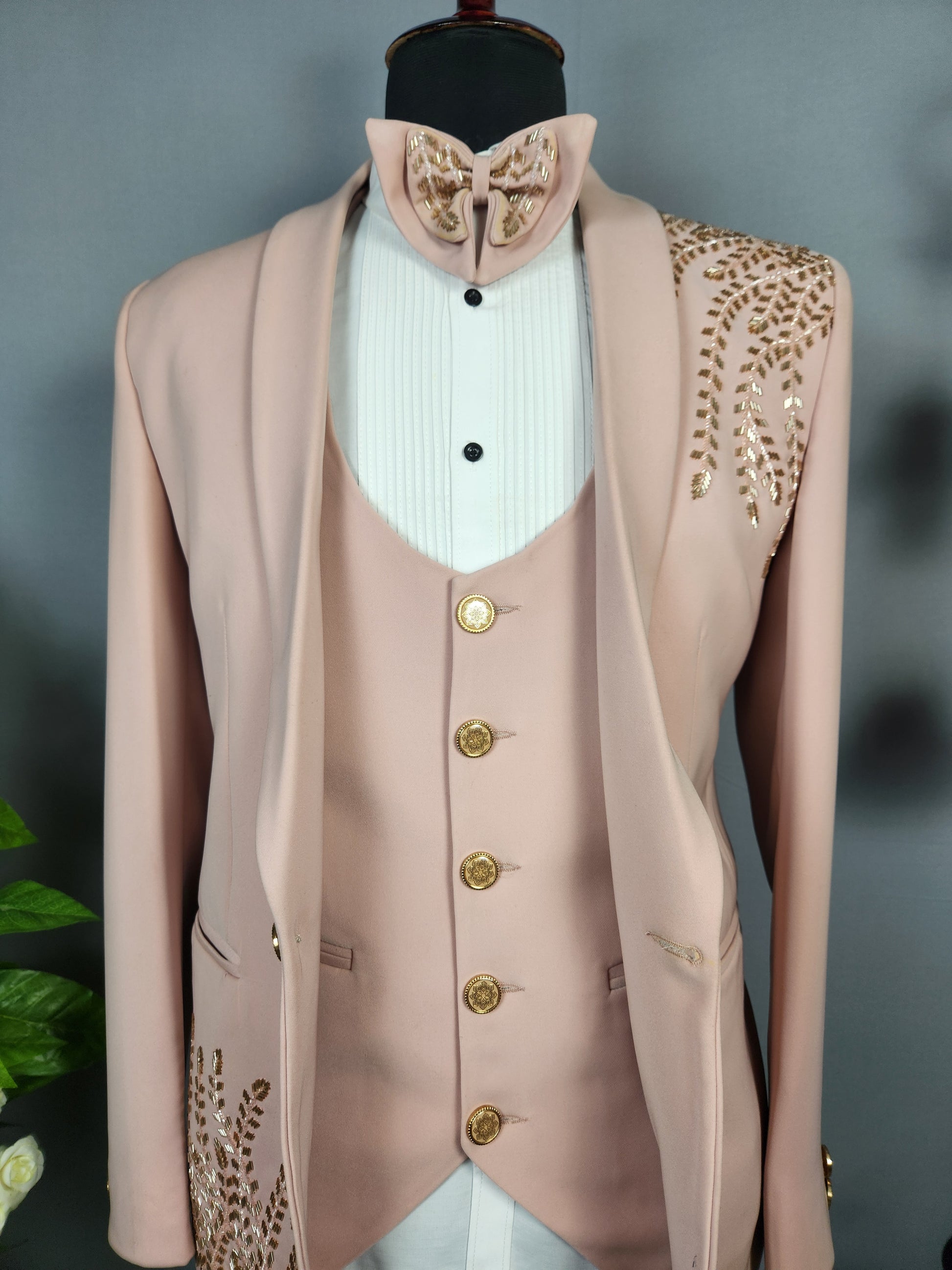 Men's dusty pink tuxedo suit for Indian groom, perfect for wedding and reception wear
