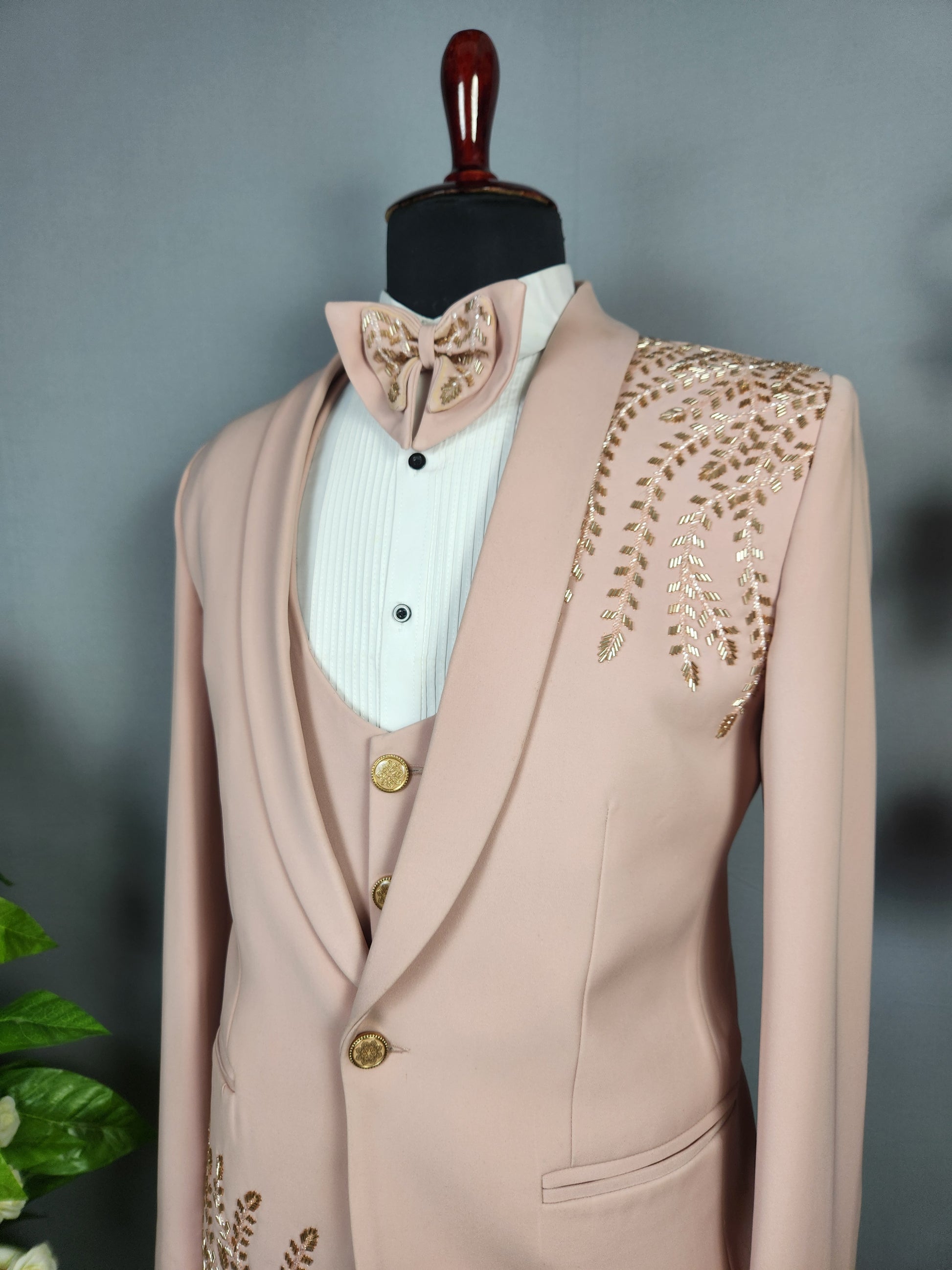 Men's dusty pink tuxedo suit for Indian groom, perfect for wedding and reception wear

