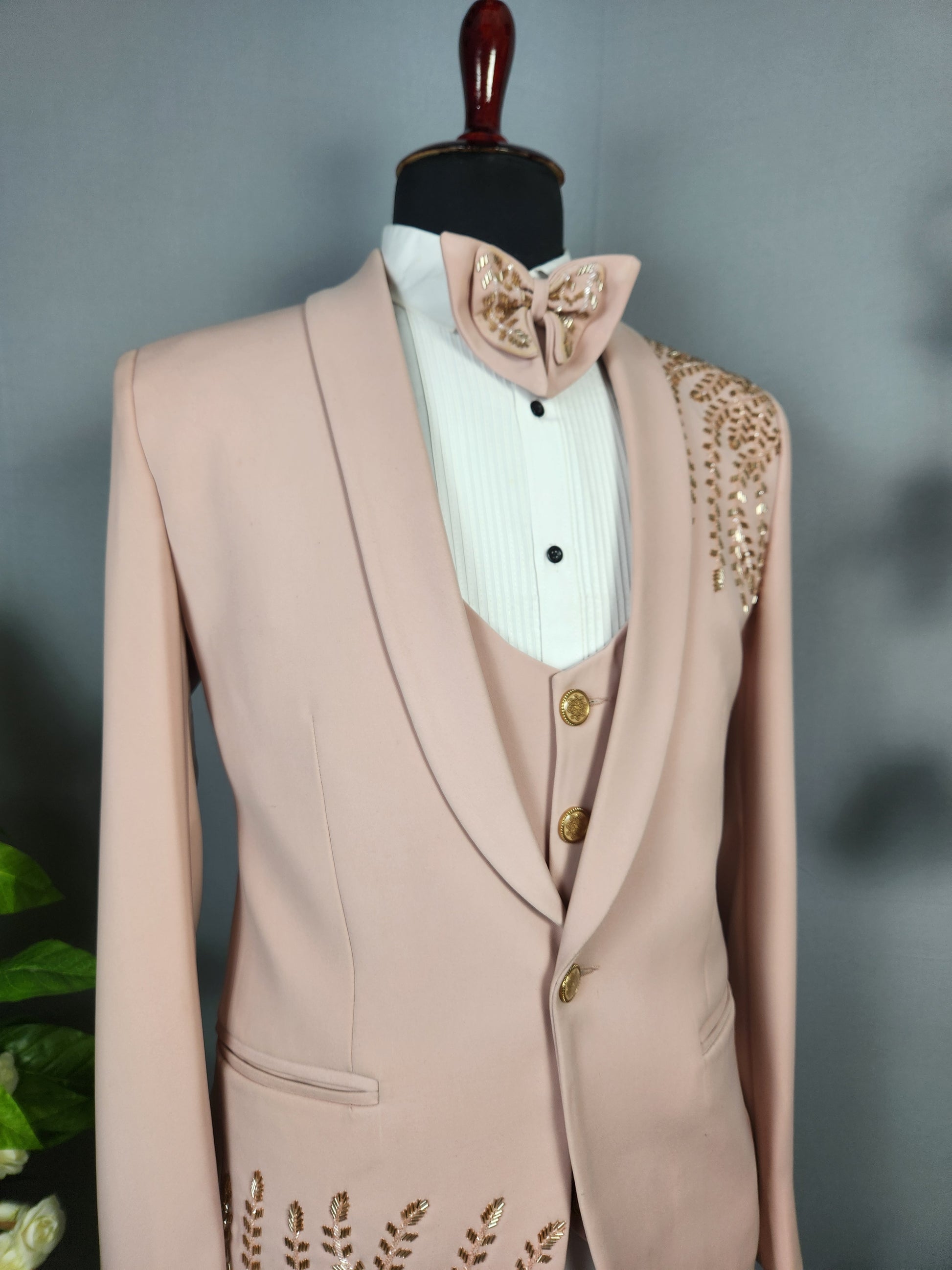 Men's dusty pink tuxedo suit for Indian groom, perfect for wedding and reception wear
