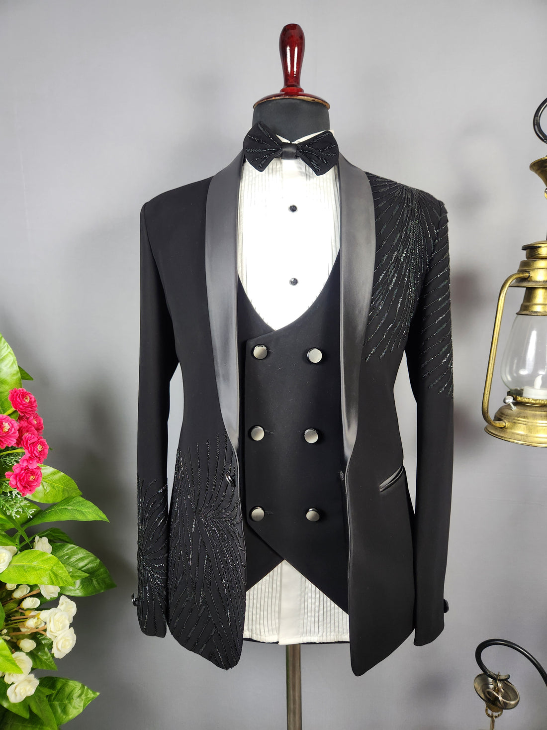 Men's black tuxedo suit for Indian groom, perfect for wedding and reception wear
