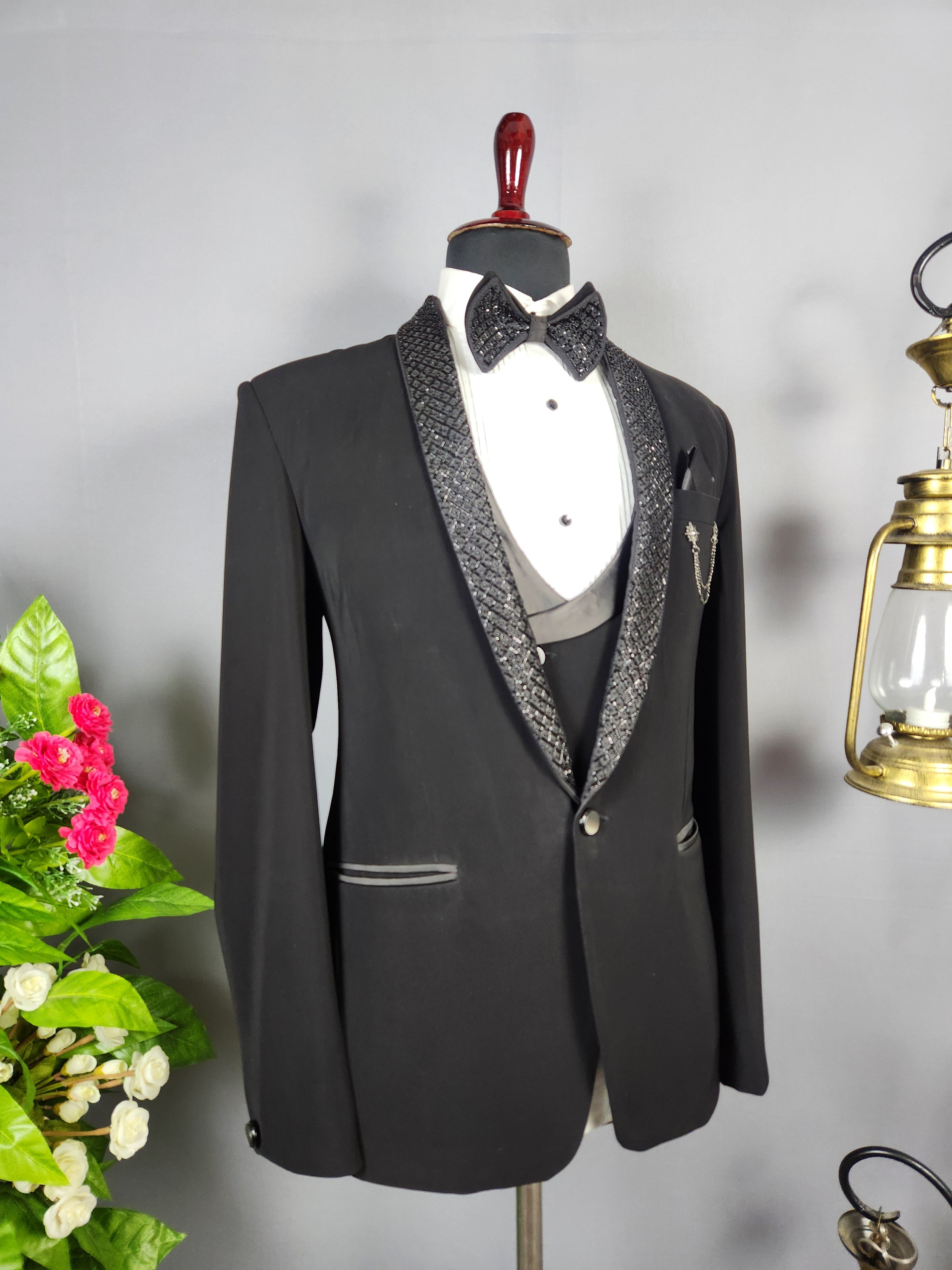 Men's black tuxedo suit for Indian groom, perfect for wedding and reception wear
