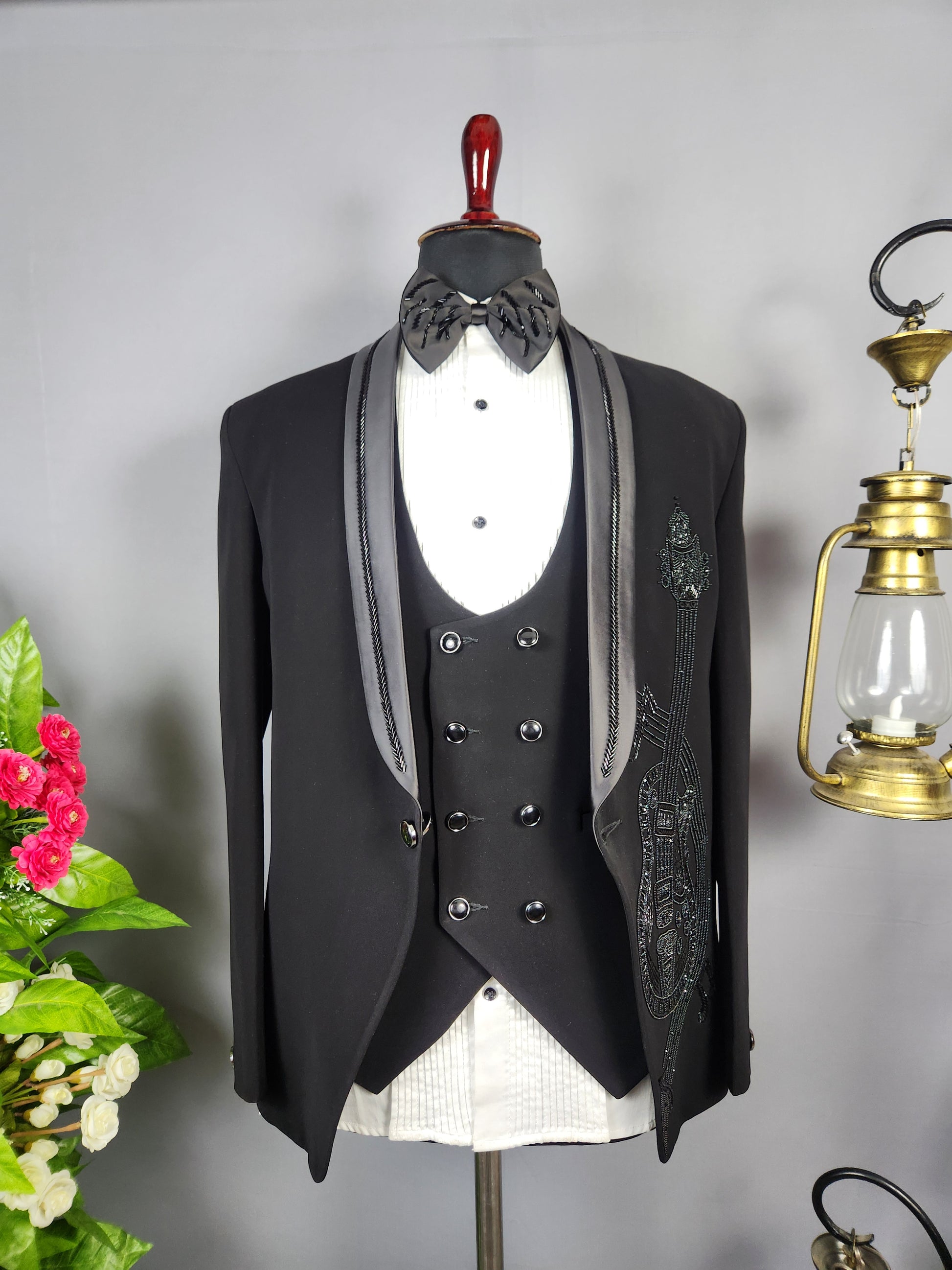 Men's black tuxedo suit for Indian groom, perfect for wedding and reception wear
