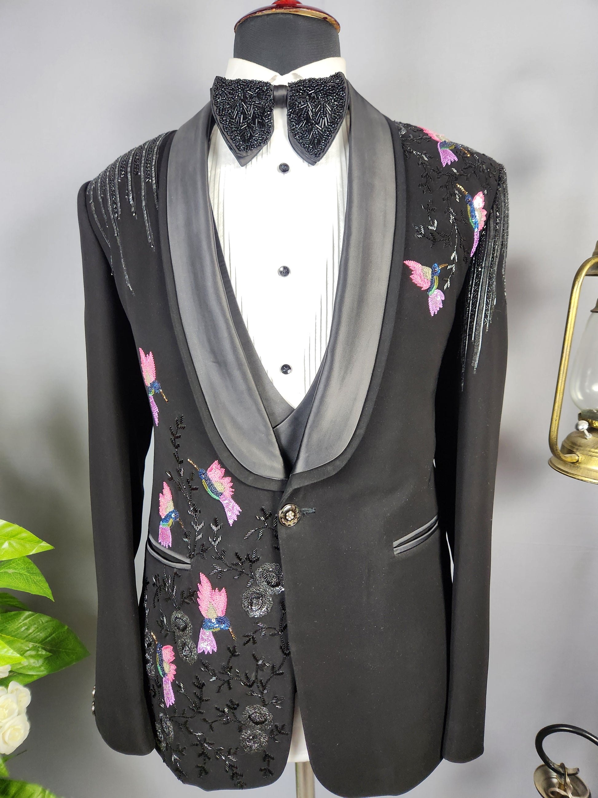 Men's black tuxedo suit for Indian groom, perfect for wedding and reception wear
