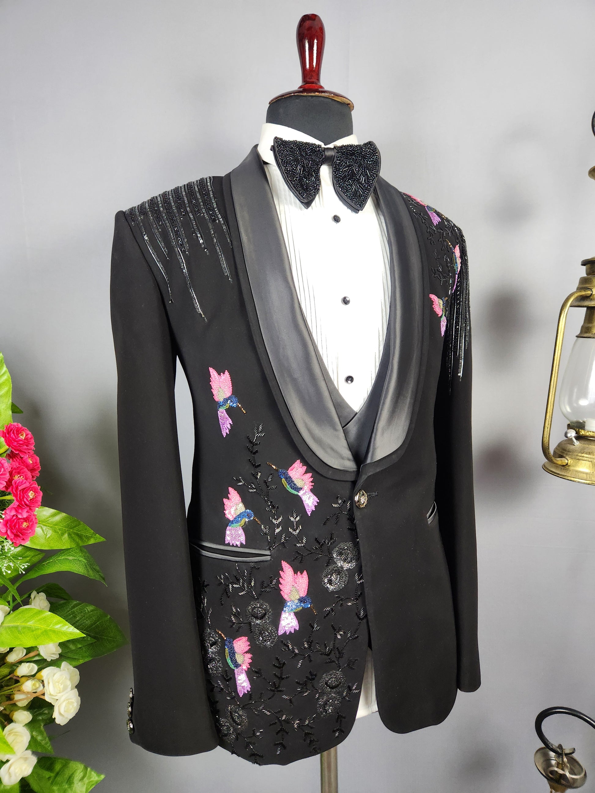 Men's black tuxedo suit for Indian groom, perfect for wedding and reception wear
