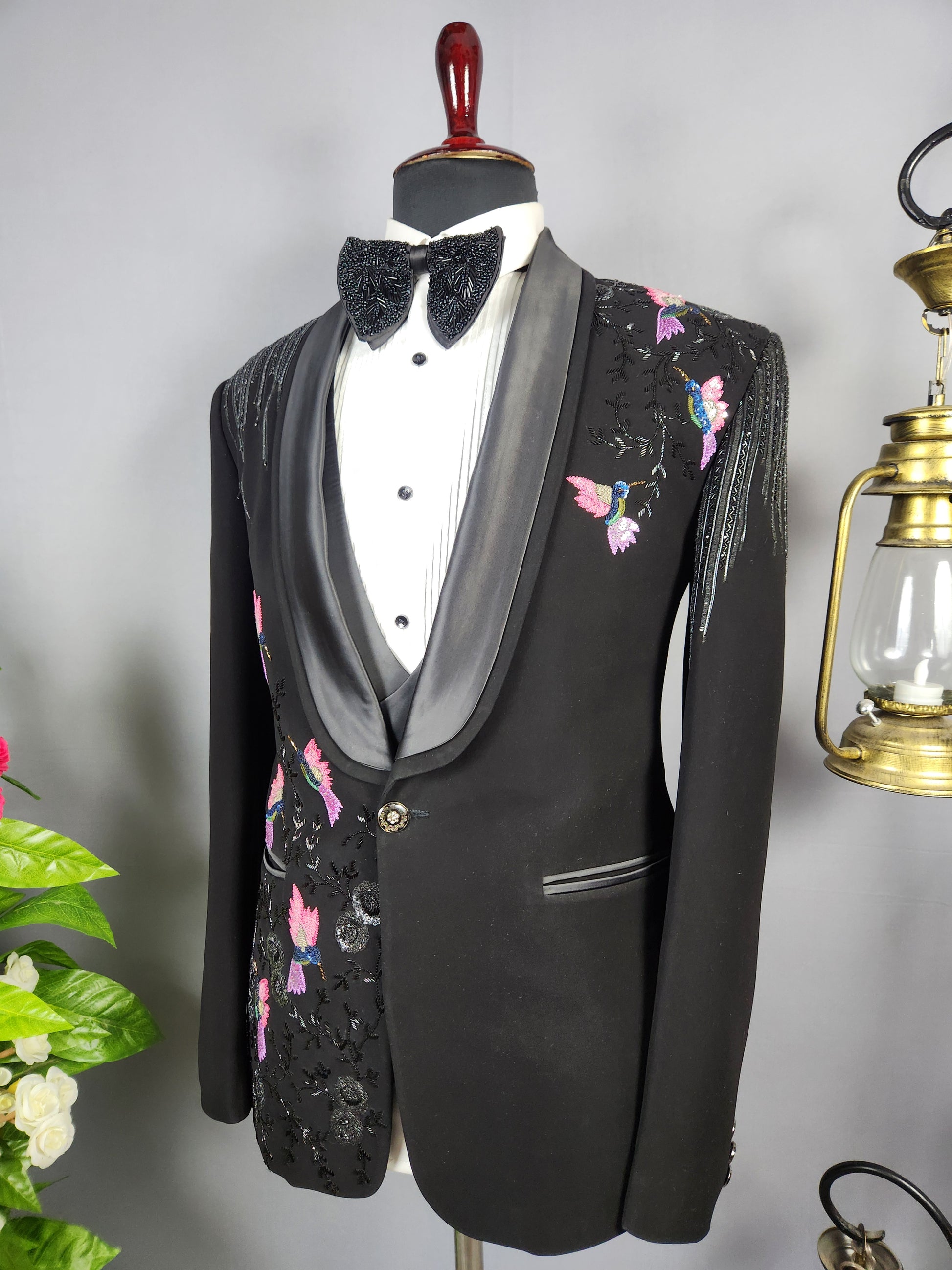 Men's black tuxedo suit for Indian groom, perfect for wedding and reception wear
