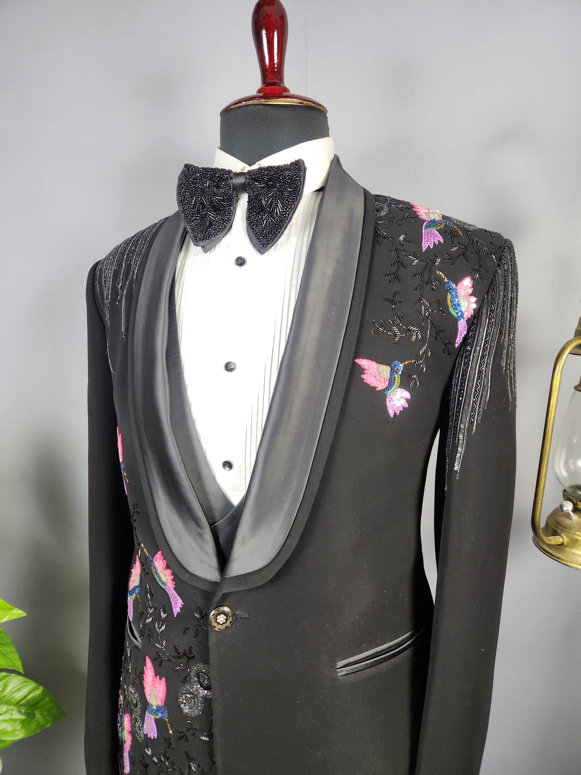 Men's black tuxedo suit for Indian groom, perfect for wedding and reception wear
