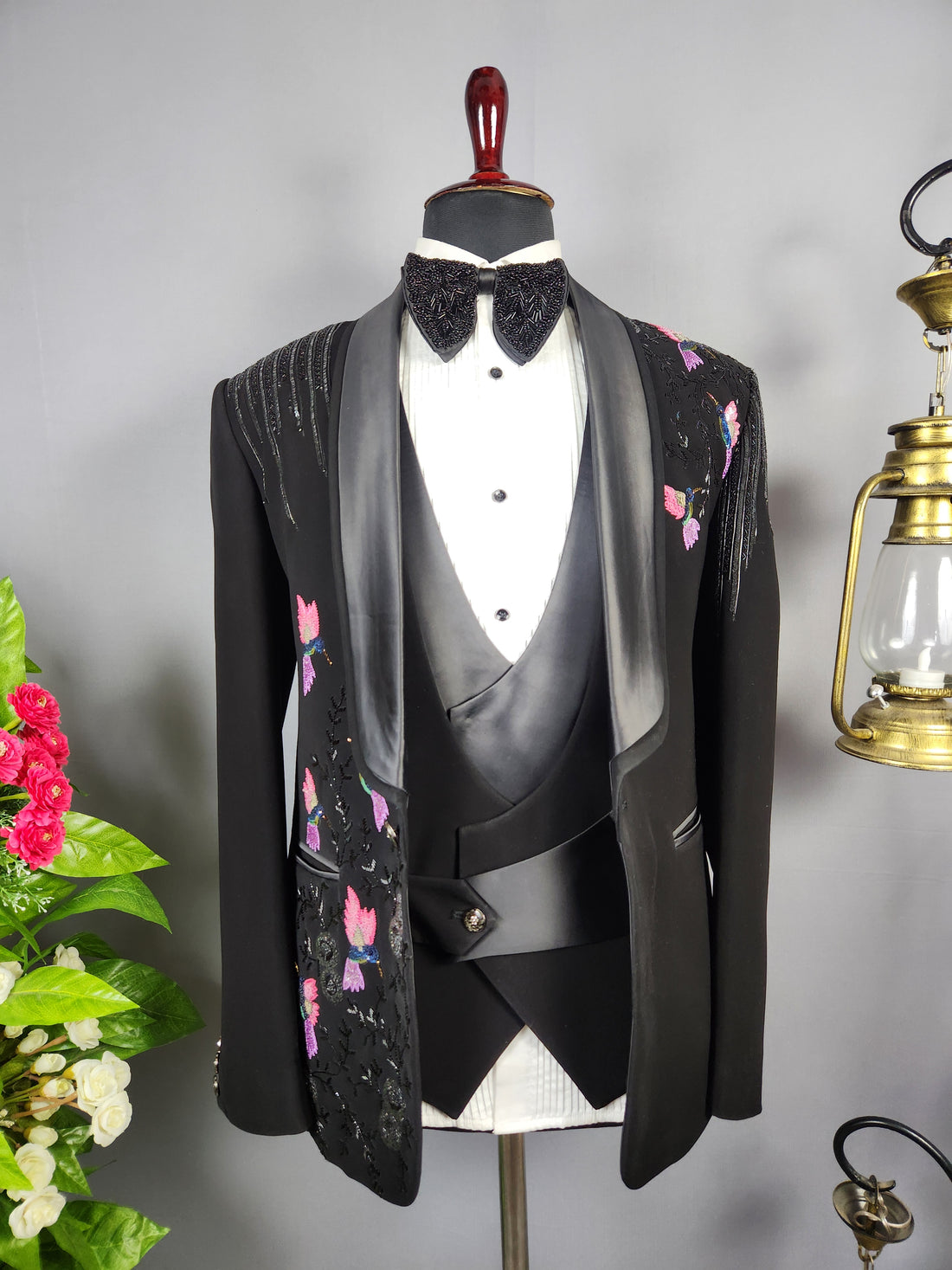 Men's black tuxedo suit for Indian groom, perfect for wedding and reception wear
