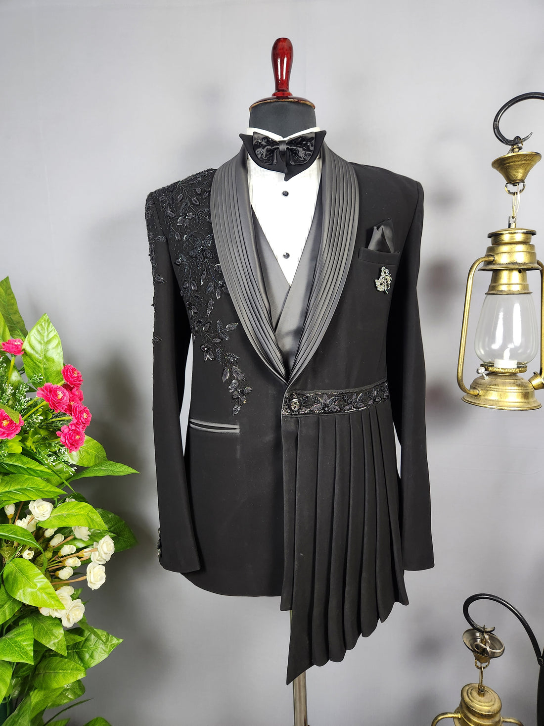 Men's black tuxedo suit for Indian groom, perfect for wedding and reception wear

