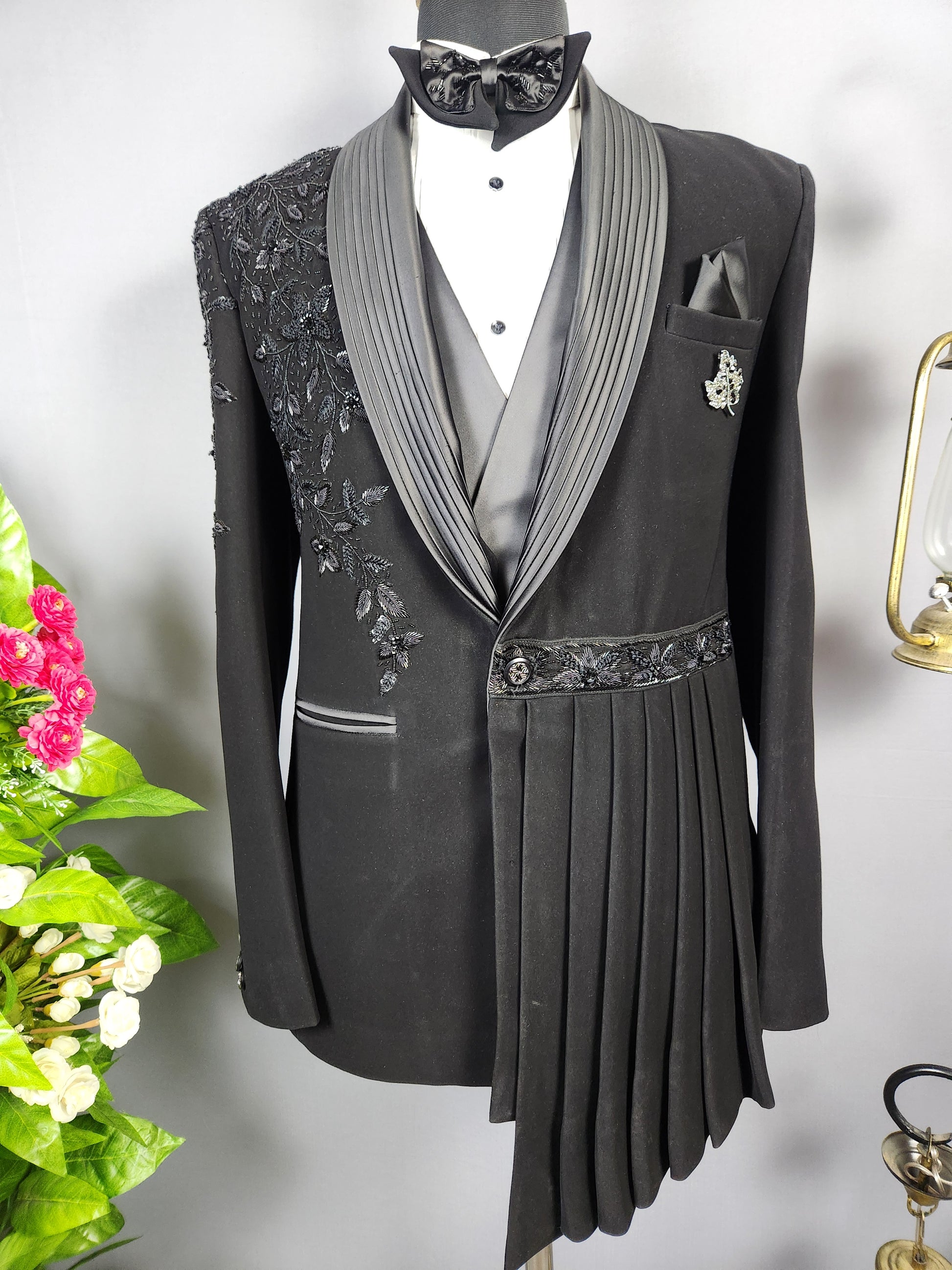 Men's black tuxedo suit for Indian groom, perfect for wedding and reception wear
