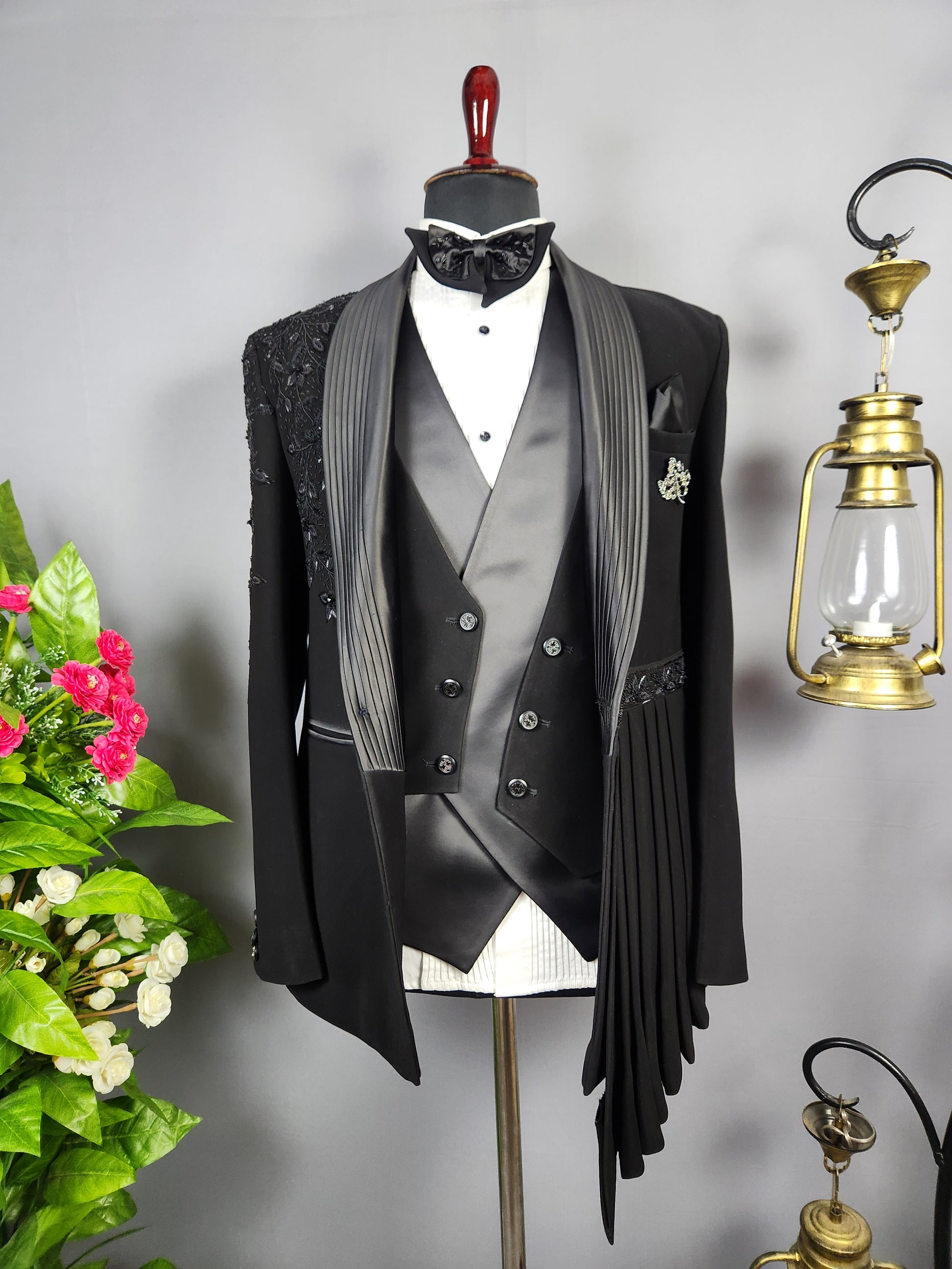 Men's black tuxedo suit for Indian groom, perfect for wedding and reception wear
