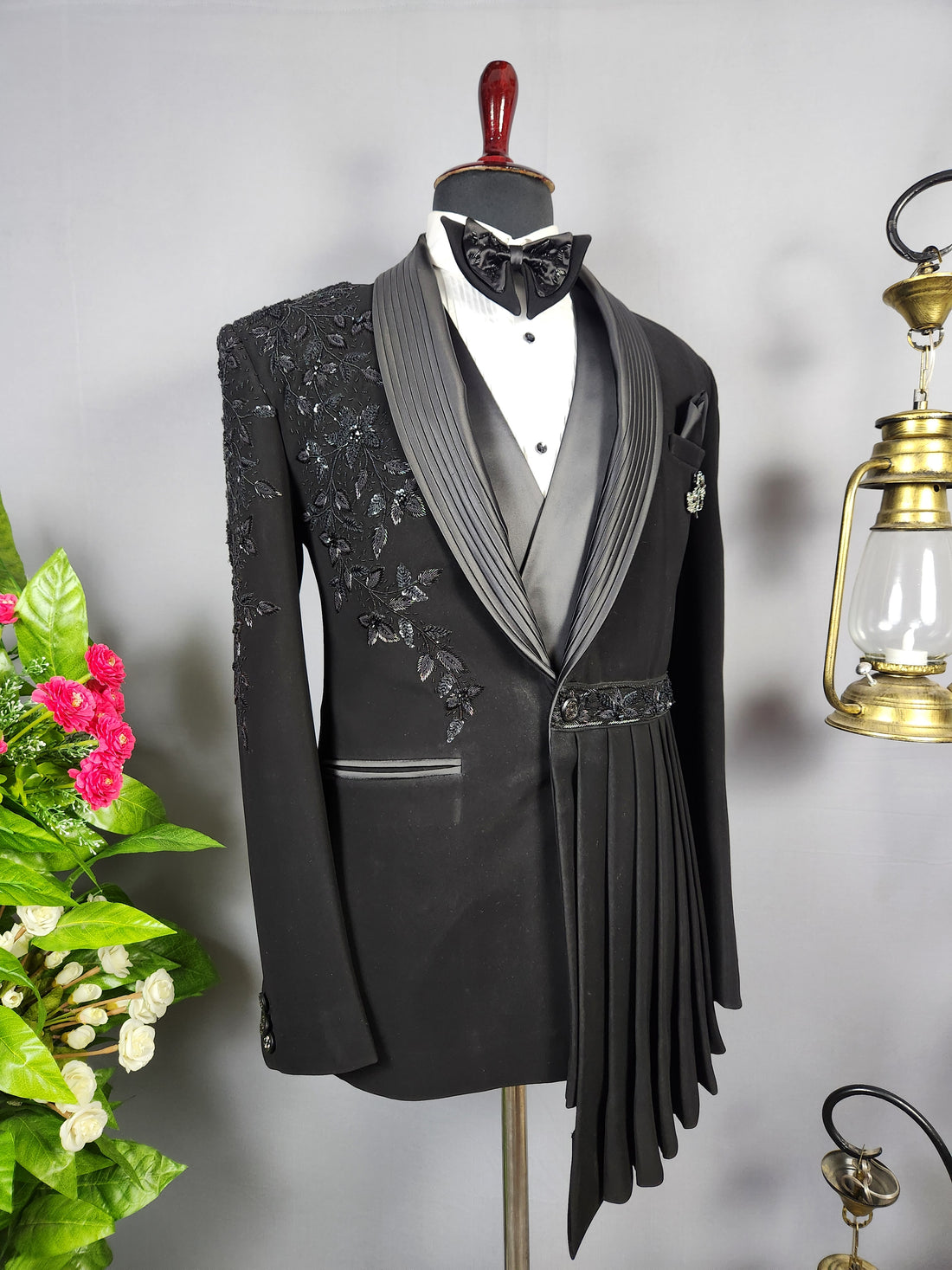 Men's black tuxedo suit for Indian groom, perfect for wedding and reception wear
