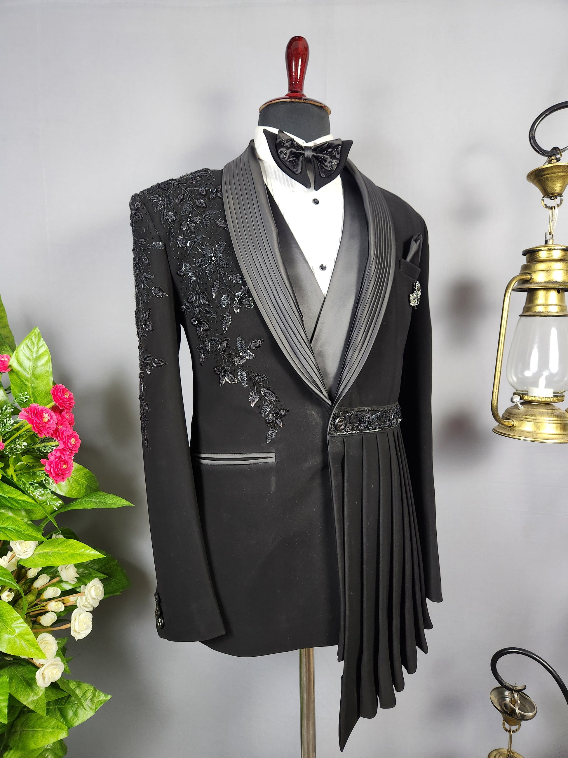 Men's black tuxedo suit for Indian groom, perfect for wedding and reception wear
