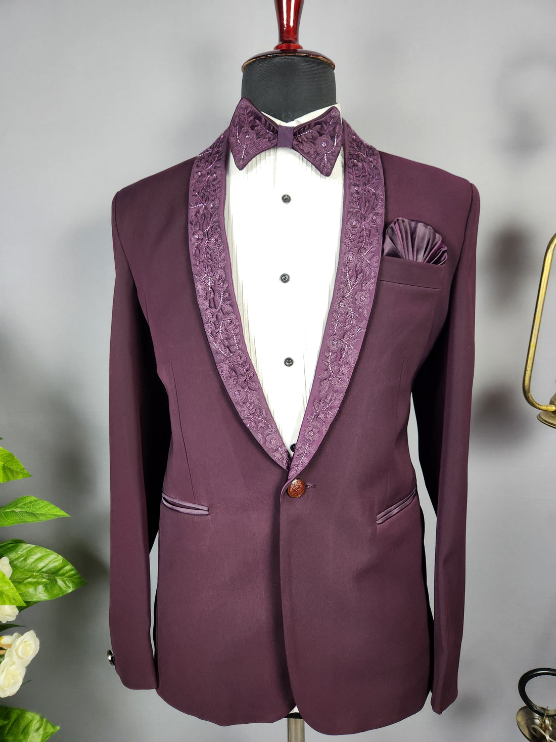 Men's dark plum tuxedo suit for Indian groom, perfect for wedding and reception wear
