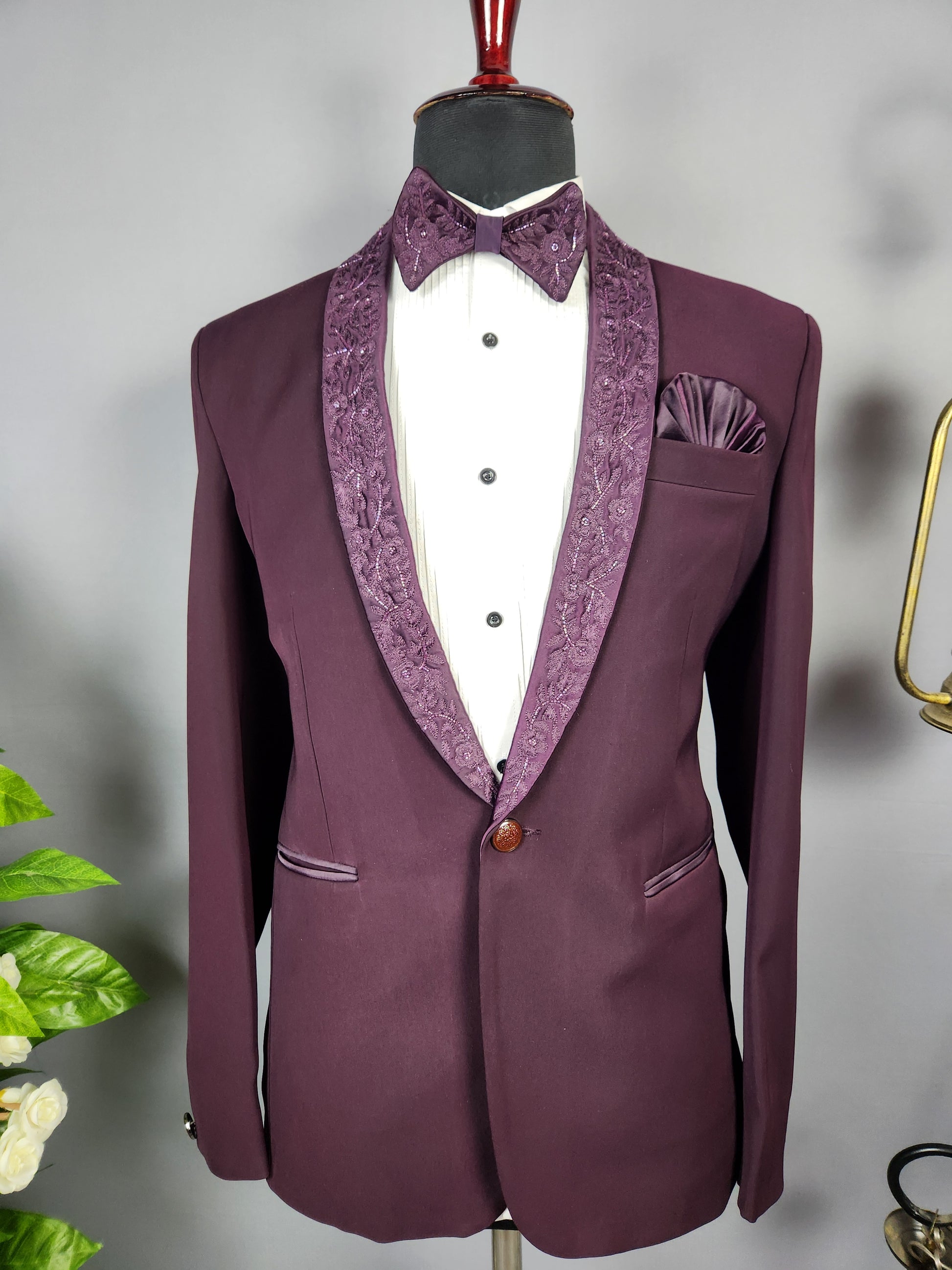 Men's dark plum tuxedo suit for Indian groom, perfect for wedding and reception wear
