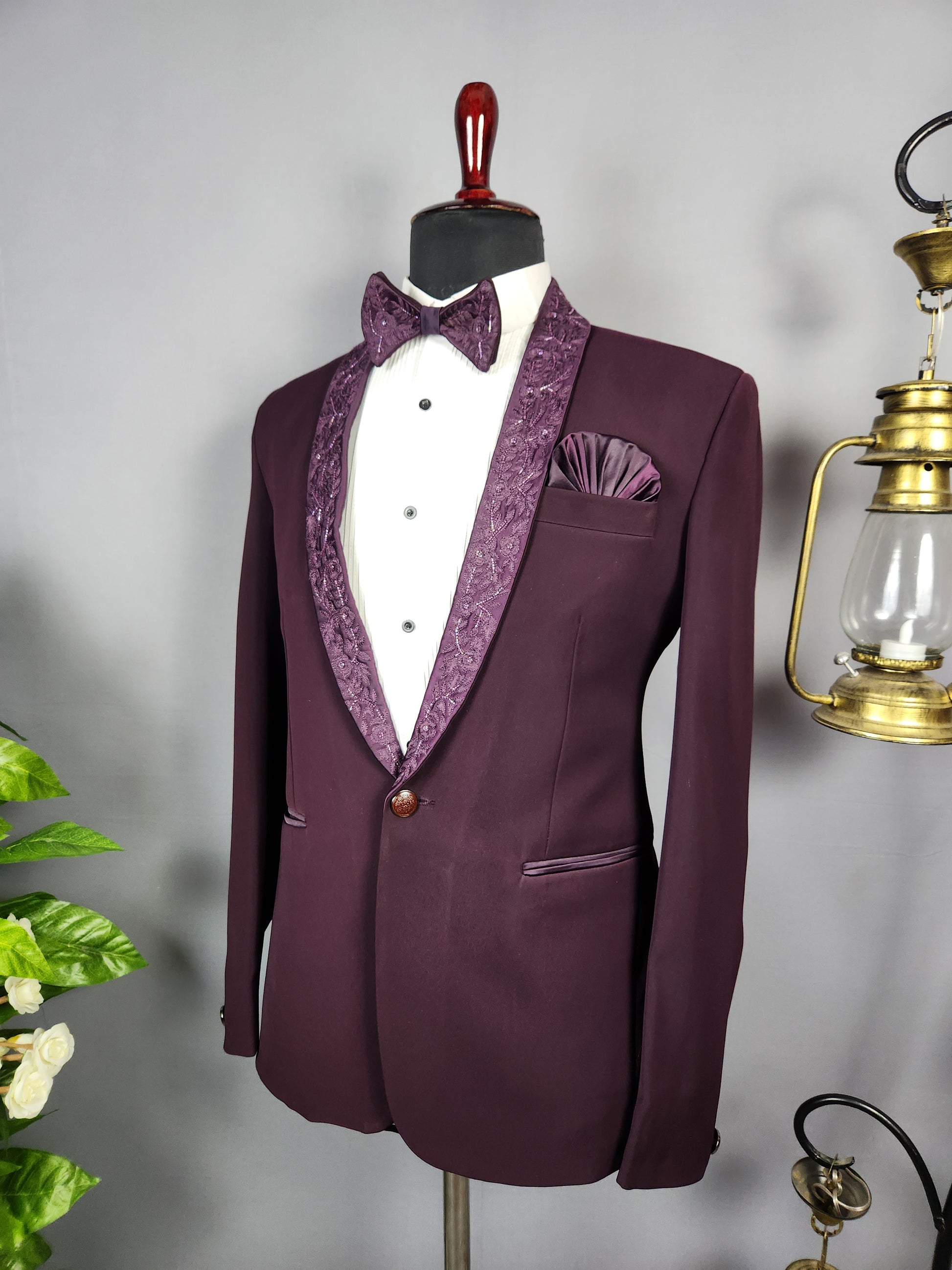 Men's dark plum tuxedo suit for Indian groom, perfect for wedding and reception wear
