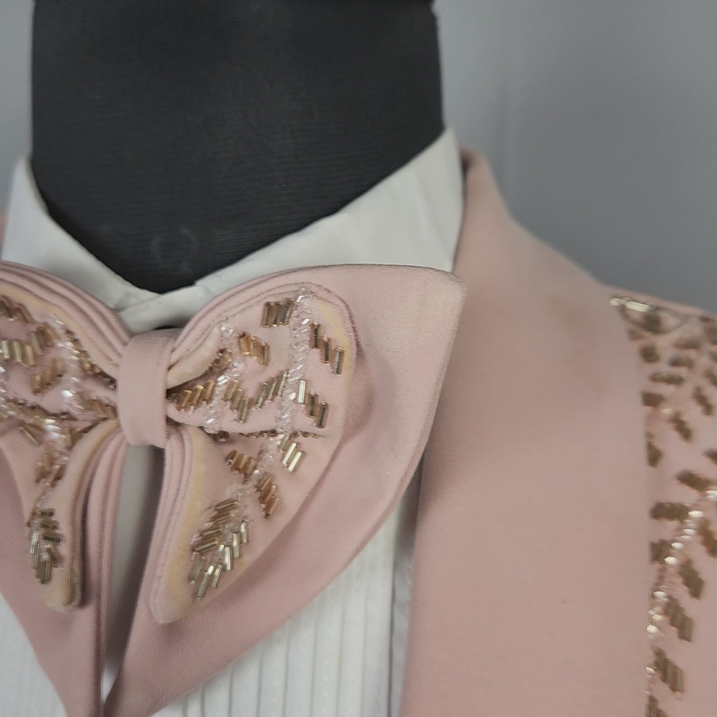 Men's dusty pink tuxedo suit for Indian groom, perfect for wedding and reception wear
