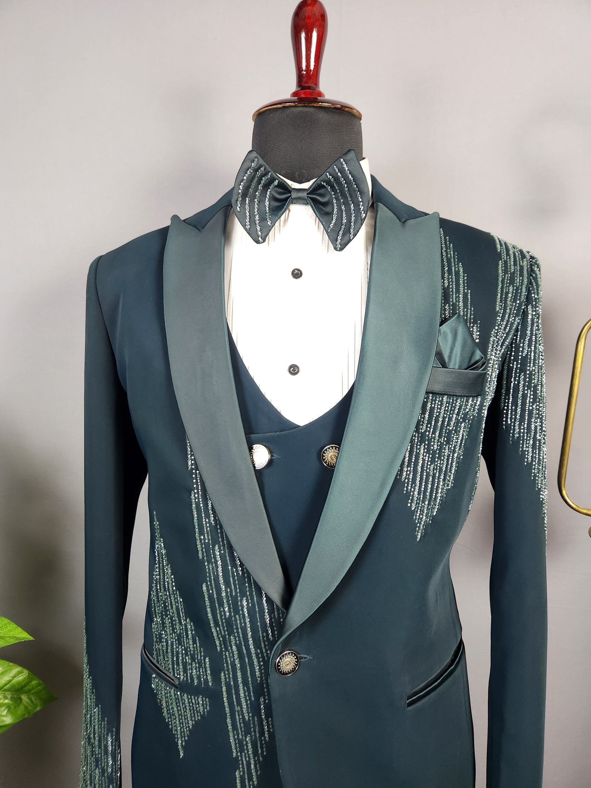 Men's teal green tuxedo suit for Indian groom, perfect for wedding and reception wear
