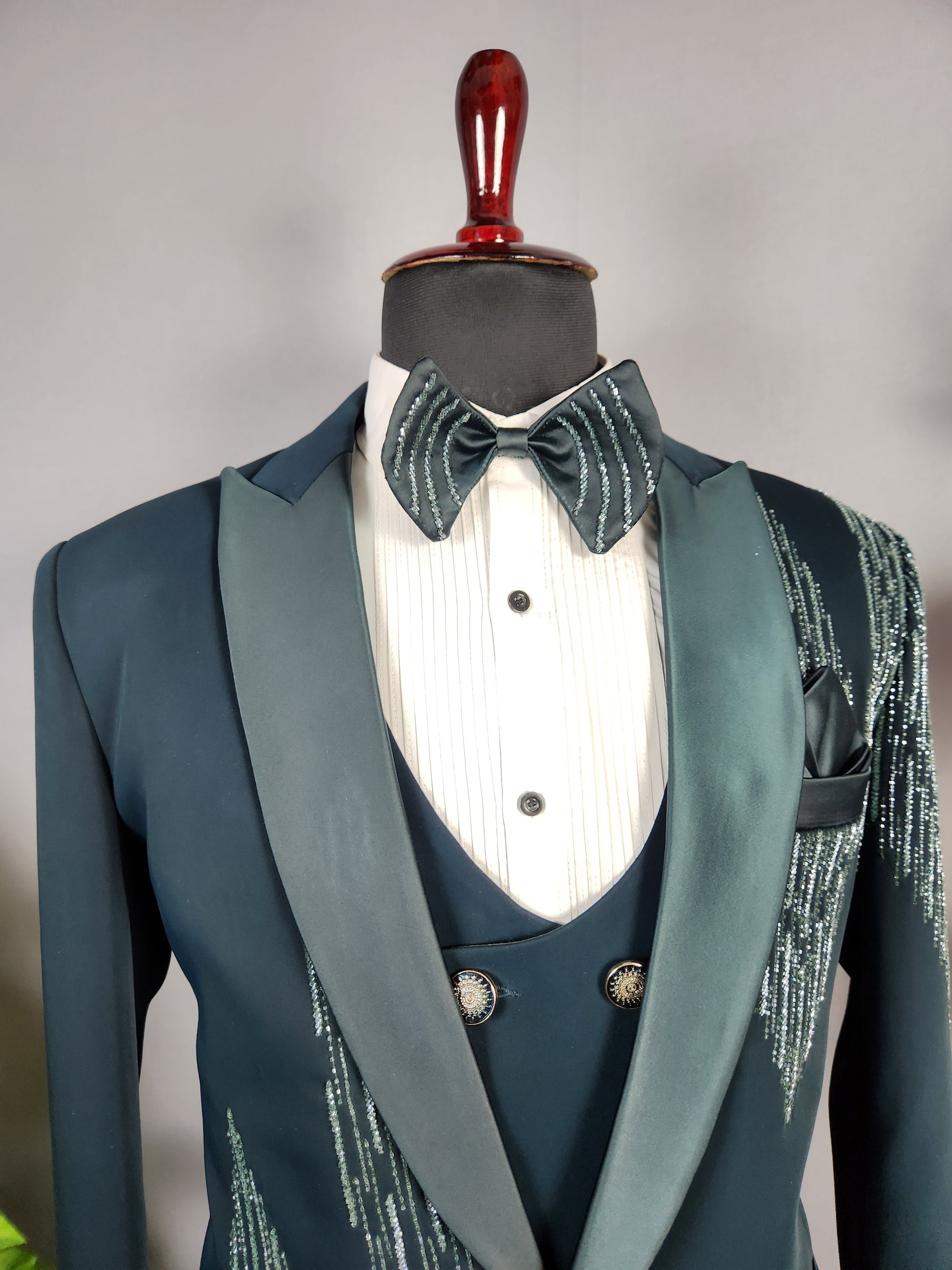 Men's teal green tuxedo suit for Indian groom, perfect for wedding and reception wear
