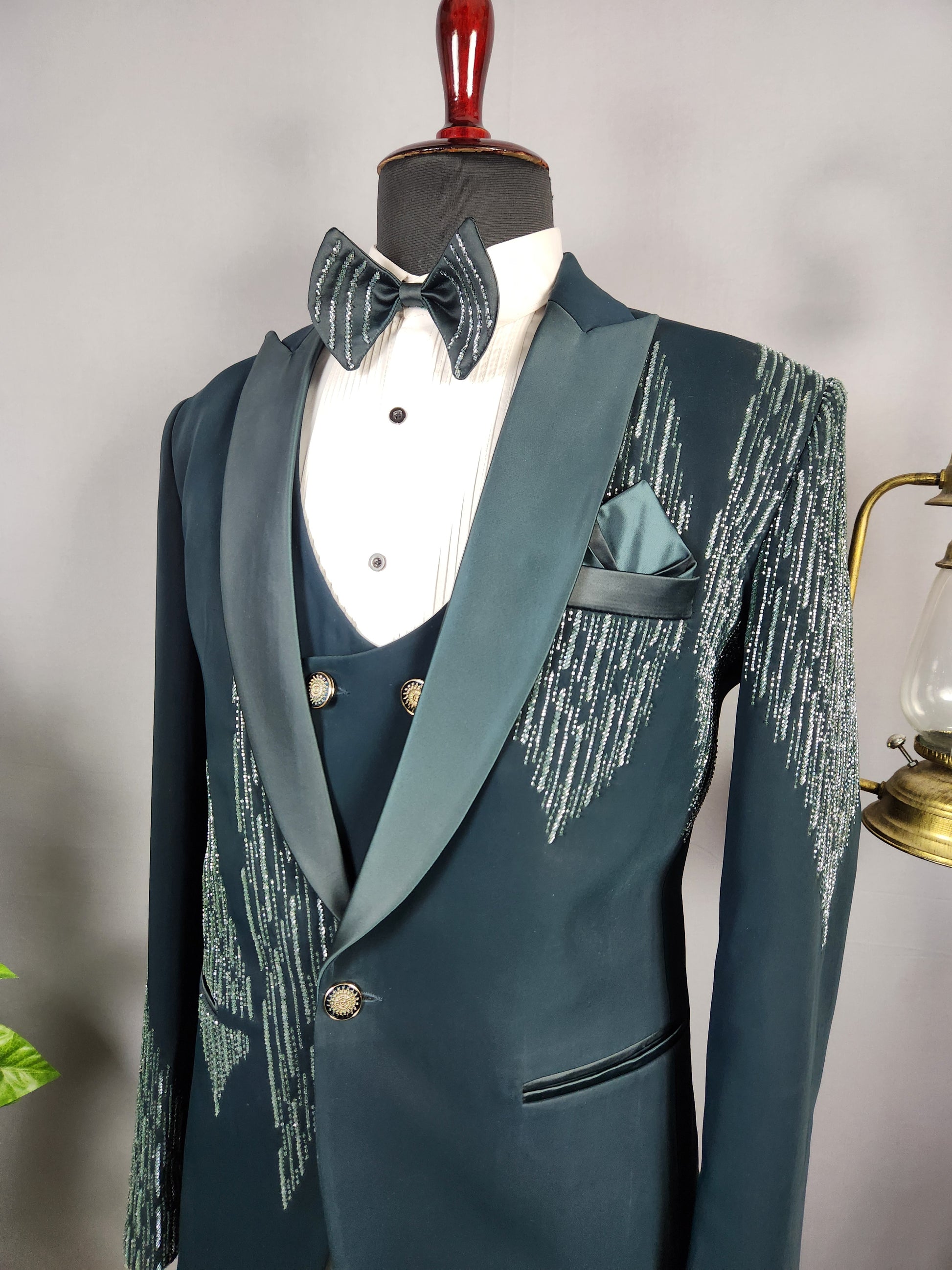 Men's teal green tuxedo suit for Indian groom, perfect for wedding and reception wear
